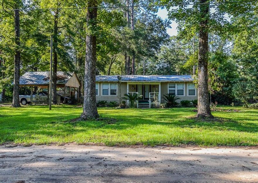 This home is located in the waterfront community of Charlotte Estates. The community offers a community park and boat ramp on Black Creek. The Home is located right across the road from the boat ramp and park offering easy access and views of the Creek. From Black Creek you also have access to the Choctawhatchee River and the Bay. There are unlimited opportunities for fishing, hunting or just being on the water. The original home was a mobile home but has been added onto to provide a larger living space. This quiet community is a great place to live or use for a vacation spot.