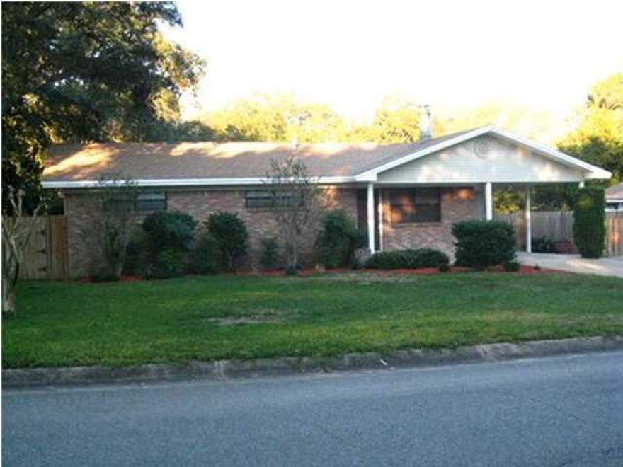 This home has been lovingly maintained! Updated kitchen, flooring; gas log fireplace for those cozy evnings with built-in entertainment cabinet and book shelves; pergo flooring and ceramic tile throughout; master bath has large walk-in shower; dining area has pergo flooring with french doors opening up to back patio. fenced back yard. Cat or small dog allowed with non-ref pet fee.