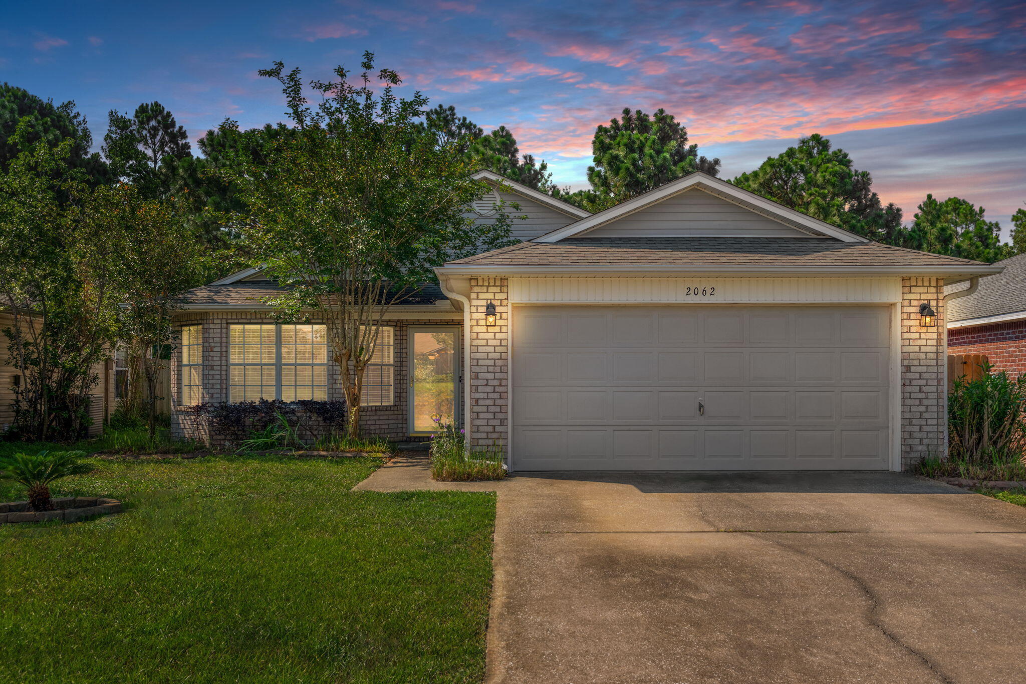 Great home in a Promise Creek in Navarre Subdivision! Three bedroom, 2 bath home with cathedral ceilings, plant shelving and neutral paint colors throughout. Living area has a bay window for larger and open feeling to entertain family and friends; The kitchen features a breakfast bar, Kitchen Island, large pantry and tiled backsplash. Refrigerator is Stainless Steel, Black stove, microwave and dishwasher; Warm Maple cabinets compliment the tiled backsplash; Very little carpet, only in the bedrooms and laminate wood flooring throughout the home. New quartz countertops in kitchen and the bathrooms; Master suite has a walk-in closet, garden tub and double vanity/ new quartz countertops; Newly added is the glassed in Patio, with an added side open patio, great for entertaining with private