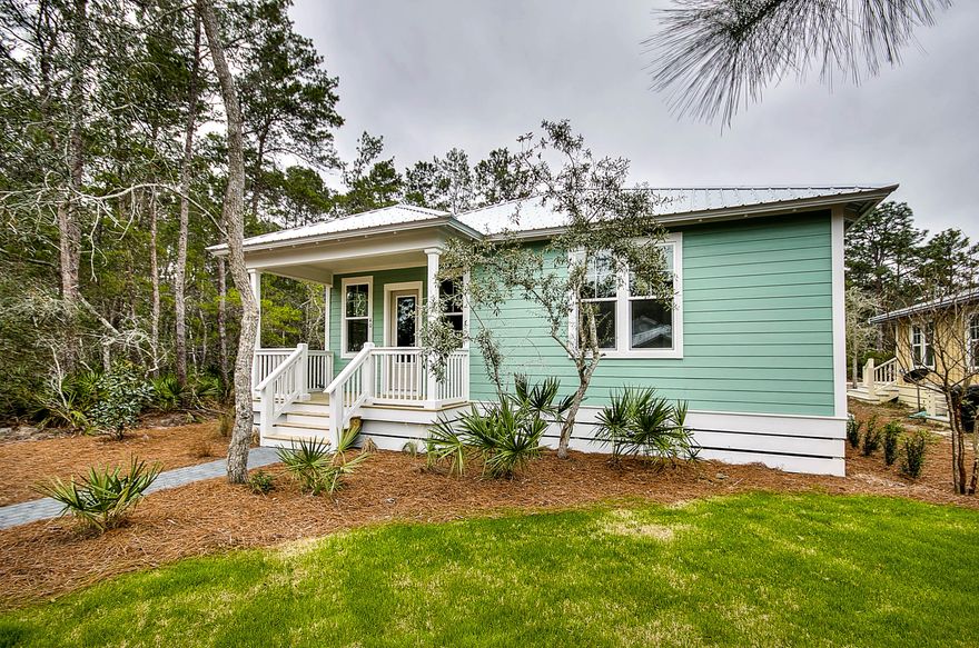 Want to live in Pt. Washington, here is your chance. Grayton Bayou Subdivision has a community pool, common areas, nature areas, picnic areas and a Bayfront park. There is a nearby boat ramp for access to the bay. A short distance to Grayton Beach and local restaurants. This three bedroom home has many extras, such as impact resistant windows, crown molding, stainless steel appliances in the kitchen, Moen facets and Quartz counter tops. There is surround sound in the main living area and speakers on the back porch. There is an alleyway for entry to the back of the home for a driveway and a garage. Also wired for Smart house and cameras. Call us today for a showing.