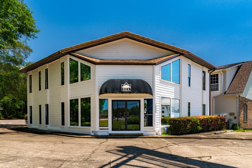 Located in a prime area with high visibility this free-standing, two-story professional office building spans 3,160 sq. ft. and has served as the headquarters for the Building Industry Association of Okaloosa and Walton Counties. The well-maintained building features a welcoming reception/lobby area, 5 private offices, two spacious conference rooms, a kitchenette with built-in storage, and separate men's and women's restrooms.The property also boasts a prominent brick monument sign and ample parking, with convenient front and rear entrances for easy access. Its strategic location near the hospital, airport, and several military bases, including just 4 miles from the entrance to Eglin Air Force Base, makes it ideal for various professional uses.