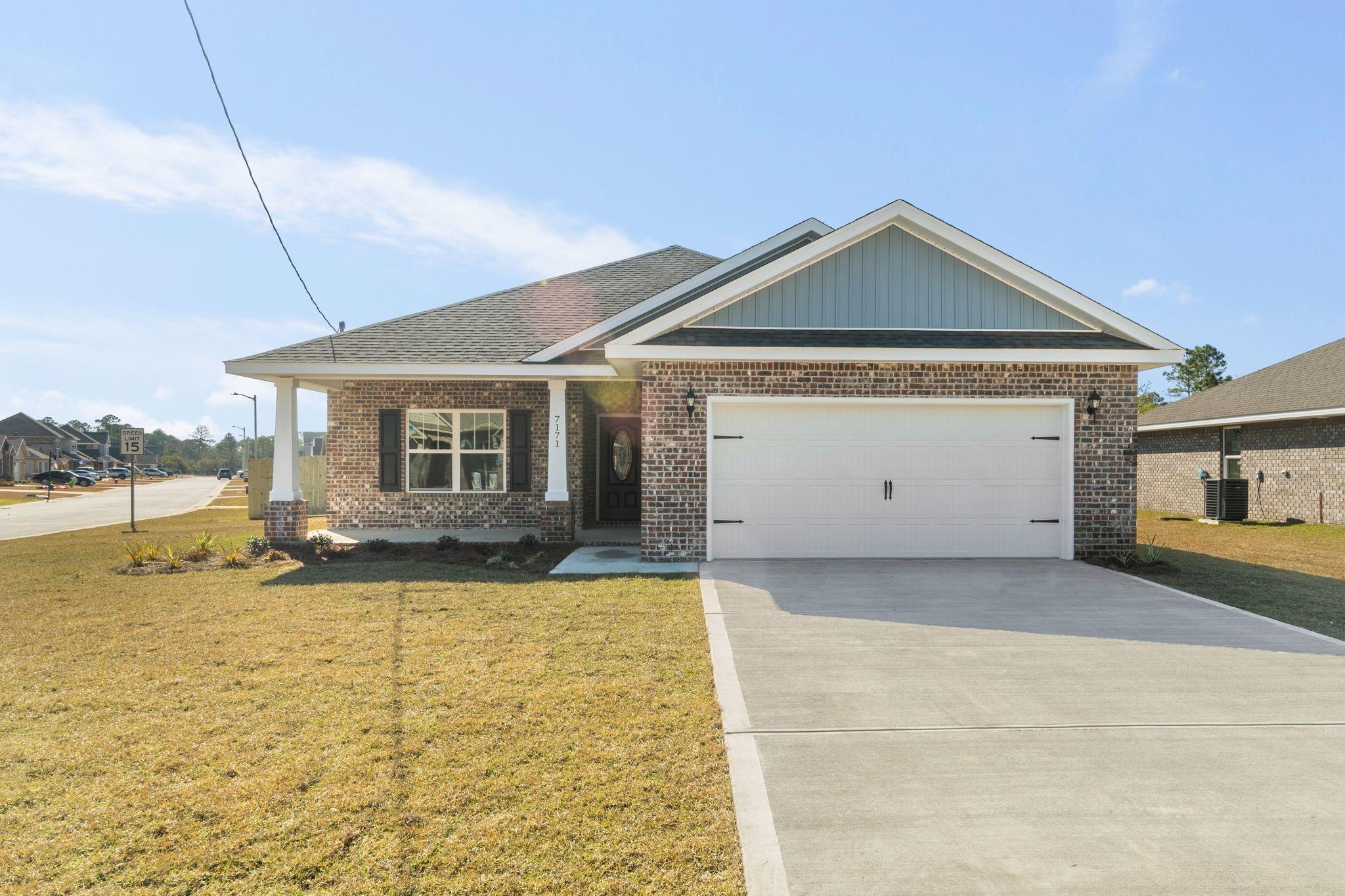 The famous Carlos Plan now building on Gordon Evans in Navarre! This 3 bedroom 2 bath brick home offers exactly what you are looking for. Wide open living room, dining room and kitchen space lined with Laminate Flooring. This split floor plan offers a spacious master suite, master bath with stand up tile shower, garden tub & double vanities. A private entrance to a covered back porch. The kitchen includes solid wood cabinets with soft close doors & drawers. 3cm Granite in kitchen and bathrooms. High end finishes include Vaulted Ceilings in the Living Room & single trey ceilings in the kitchen and master bedroom, brushed nickel fixtures, lever style door handles, crown molding in the treys & more! Finishing touches include luxury porch and