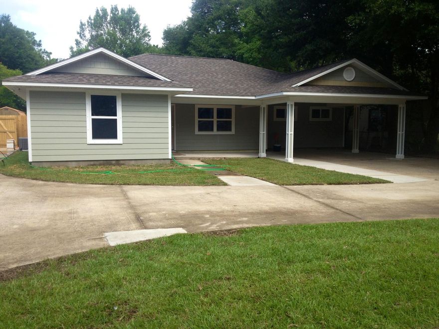 Beautiful cottage style home! The list is long: new roof, new HVAC and hot water heater, new windows and all new electrical, new well and sprinkler system and new square footage. The master suite has a deck off the back that has a view of the pool. This split floor plan house feels much larger than the dimensions imply. There is an oversized covered porch in the back yard, just off the dining and living area. It is trimmed out with tongue n groove pine, as are the carport and front walkway and front door entrance. The kitchen/ living area is an open floor plan with 11 foot ceilings and recessed can lights. Huge back yard, outdoor shower, beautiful pool. Too much to mention! House is in older neighborhood, 2 new houses being built up the street. Centrally located. Unique features.