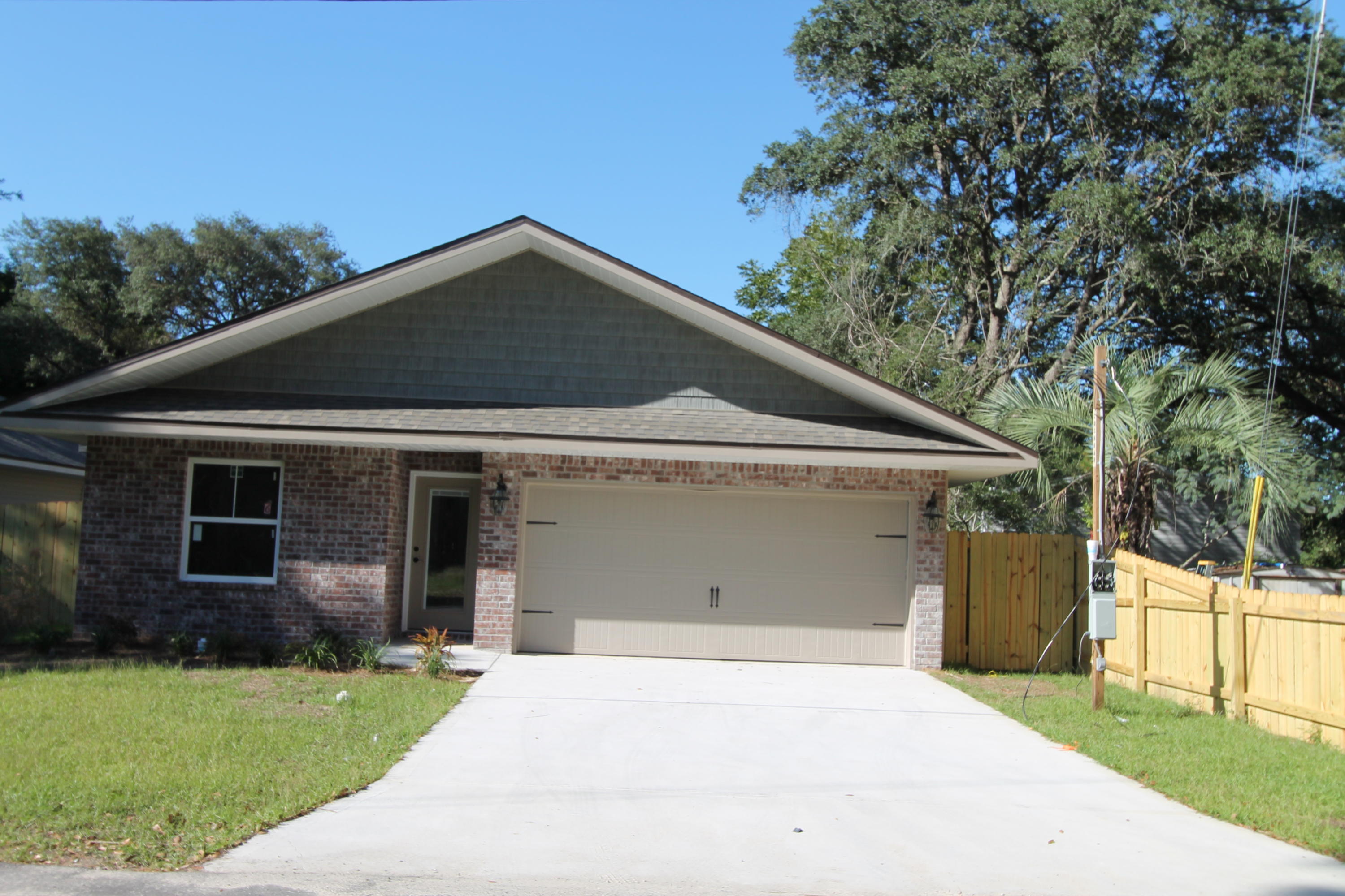 Seller pays closing costs, first year of insurance, and pays to set up escrow accounts. Call for details. Brand new construction! Location, Location, Location!! As you enter the foyer through the covered front porch, bedroom #1 and # 2 are on your left. As you continue down the hallway, you will enter the kitchen which will boast maple Cabinetry w/ island, crown moulding, 3 cm. granite countertops w/ bull nose edges, stainless appliances, an oversized breakfast bar and pantry. The oversized great room is in the rear of the home, has a vaulted ceiling, and opens to a Large covered porch, which is perfect for entertaining. Tile flooring is throughout the main living and wet areas. The lighting package is upgraded and very tasteful. The master is roomy,has 2 large walk-in closets and crown moulding. The master bath has a double vanity, whirlpool garden tub with a separate shower, a private water closet, and a linen closet The yard is beautifully landscaped, has a privacy fence, and comes complete w/ a well, sprinkler system, and timer. Insurance will be very reasonable, as home is built to today's code. Home has a Taexx ''in the wall'' pest control system that is serviced from the exterior of the home, for owner's convenience. Completion is expected in mid. February 2016.