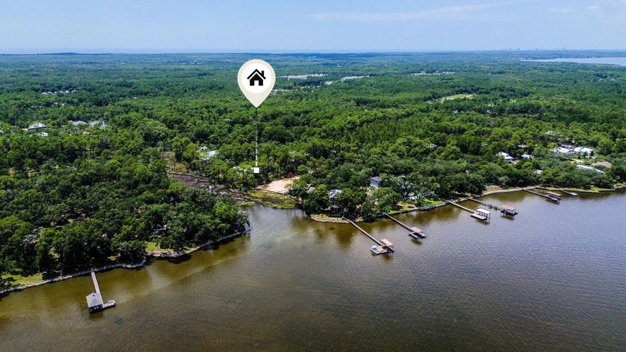 Come Build your ideal waterfront retreat on this expansive 0.68-acre bayou-front lot in the serene Eden Bay Estates. Towering oaks line the quiet streets, enhancing the charm and tranquility of this exceptional setting. A small canal connects the property to the open bay, with room for a potential dock, providing easy access for paddling and waterfront adventures.The stunning white-sand beaches and  all that 30A has to offer is only minutes away. This lot offers the perfect balance of relaxation and coastal excitement. Bring your dreams and building plans. This is a unique opportunity to build in Eden Bay Estates, Lot is level  with plenty of room for your forever  home plans.https://youtu.be/klPQexTVcWg?feature=shared