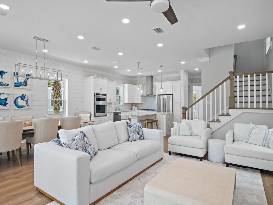 Embrace the coastal charm of Seacrest Beach's newest gem - a pristine, move-in-ready haven that redefines modern living. Freshly constructed and fully furnished, it's a dream investment for second-home seekers and rental enthusiasts alike. Dual living areas spanning both floors, with a scenic porch for alfresco gatherings, make hosting a breeze. Revel in the sleek rock fireplace, lavish tiled showers and a standalone soaking tub. A convenient outdoor shower, two-car driveway and hardwood floors grace this masterpiece. Top-tier appliances and waterfall countertops adorn the kitchen. Endless entertaining possibilities await. Dive into the pool, bask in beach access and stroll to Alys and Rosemary Beaches' boutiques and eateries. This is living, elevated.