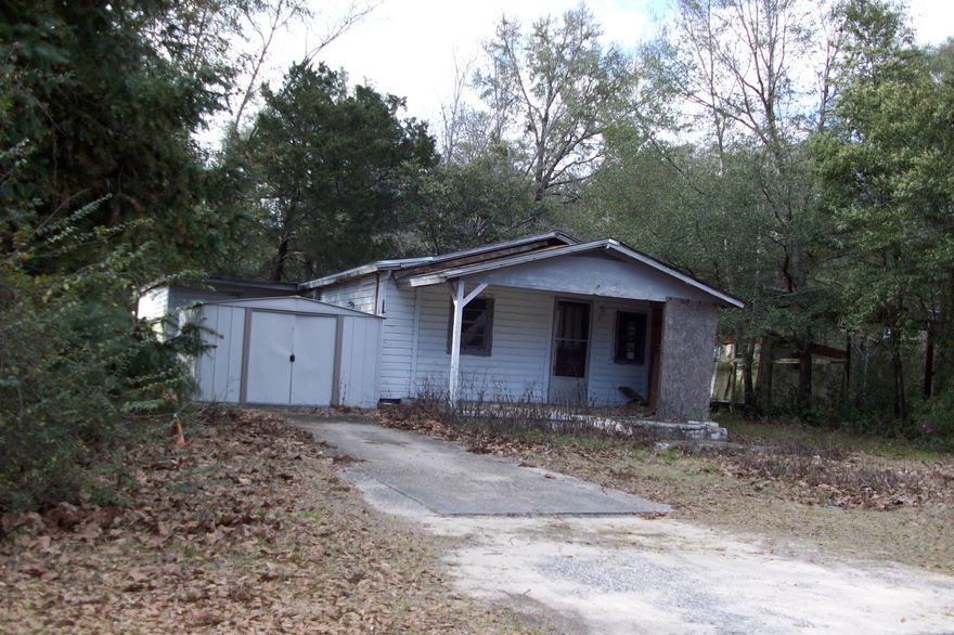 PRICED TO SELL AT LAND VALUE!!! Great investment opportunity. This property has two homes and outbuildings. One home faces Cobb, has 928 sq.ft. living space the second home is accessed off of E. Railroad Ave. and has 748 sq.ft. living space. No value given to houses and they are in need of major repairs. You can clear the lot and build or renovate, choice is yours. Check it out today. Property being sold AS-IS PRICED TO SELL!!! accessed off of E. Railroad Ave. Property is being sold AS-IS