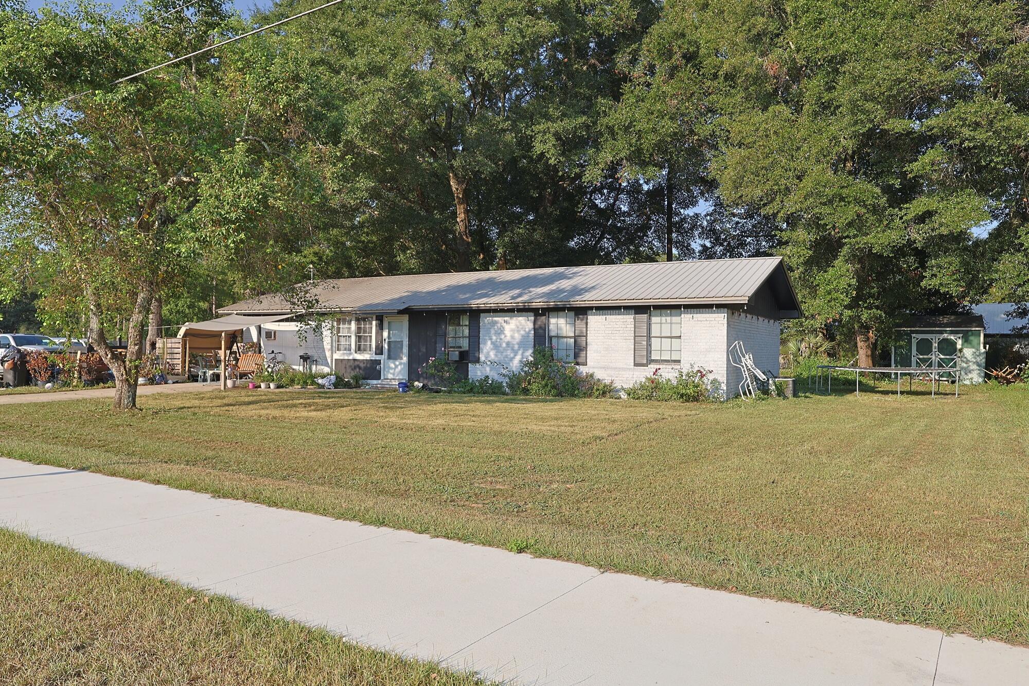 Charming 4-bedroom, 2-bath single-family home in Defuniak Springs offering 1,150 sq. ft. of living space. Built in 1991, this property sits on a spacious corner lot and provides a solid opportunity for buyers seeking value. The price reflects the home's need for light updates, making it a great option to customize to your taste. Convenient location with access to area shops, schools, and local amenities. This home is occupied so please be sure to plan ahead and schedule your private showing. Buyer to verify all measurements and pertinent data.