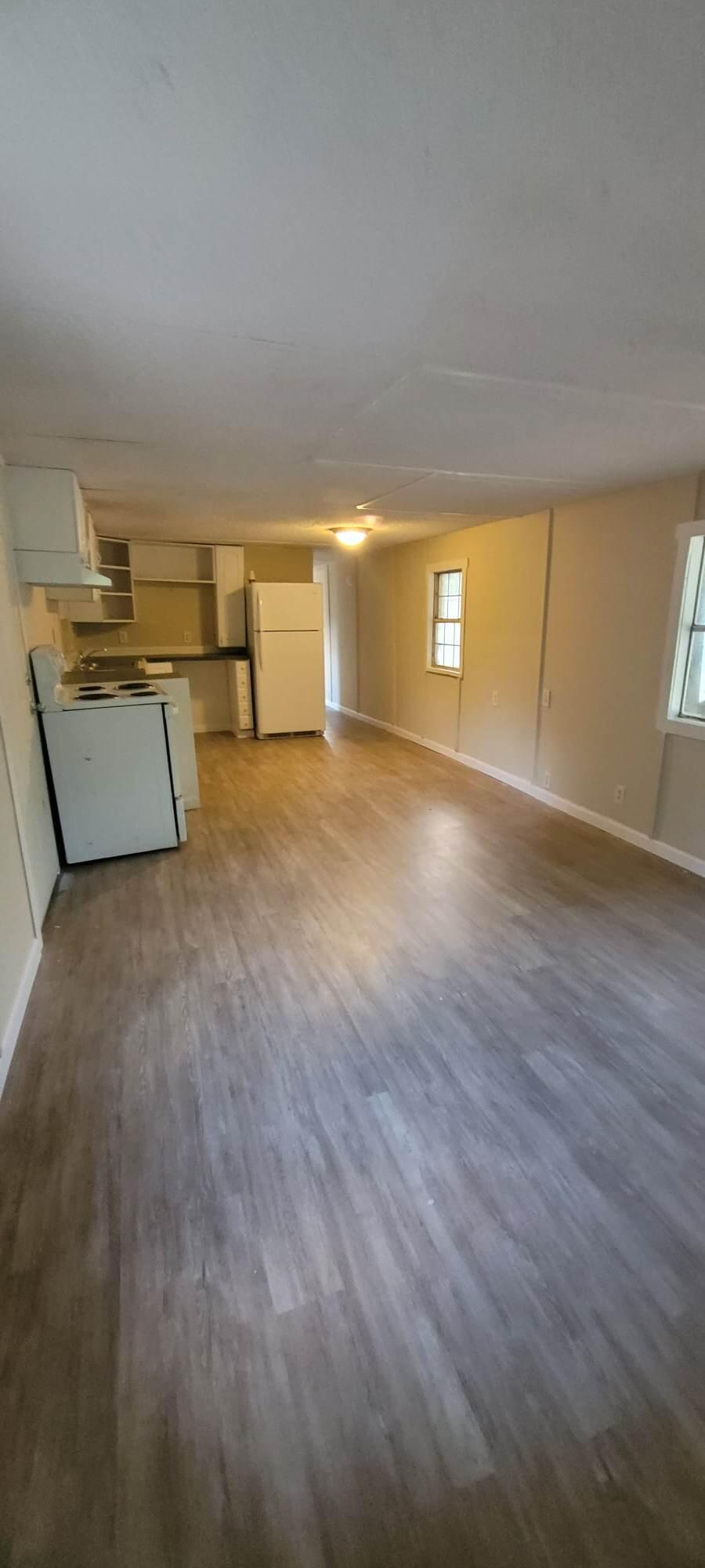 Large remodeled mobile home with 3 bedrooms, 1.5 baths, and laundry room. Quiet park