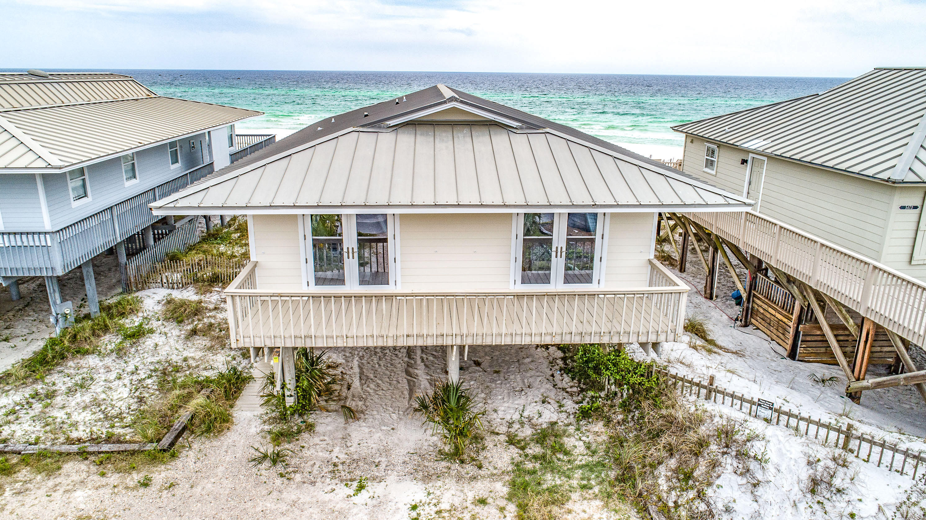 As soon as you enter the doors of this chic beach front cottage you will be mesmerized by the stunning views of the beautiful Gulf of Mexico. This charming home is located near Dune Allen on West 30A close to all of the best local shopping and dining! As you venture through the home, you will fall in love with the true beach lifestyle the home offers. Walk outside onto the large porch where you can host magnificent parties and gatherings with friends and family who are sure to be impressed by the charming and yet simple and elegant features of the home. Once you view this stunner you will be ready to call it home!