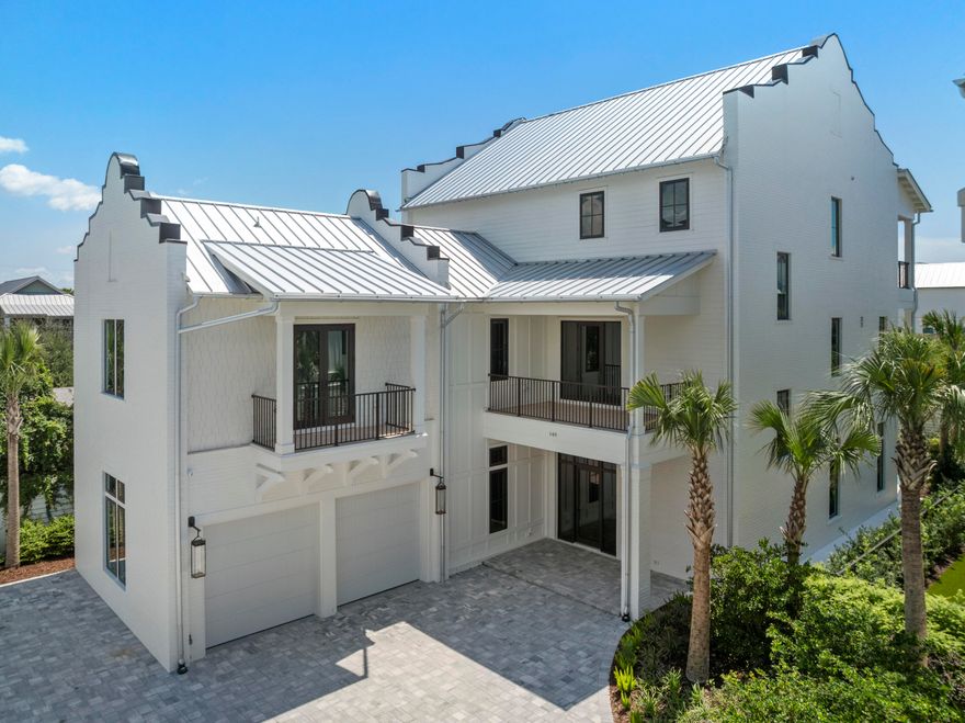Coastal Elegance Elevated | 140 S Wall Street, Inlet BeachA seamless blend of elegance and ease, perfect for living or investing in 30A. Designed by Tailored Interior Group of Charlotte, NC, this 7-bedroom, 7.5-bath residence spans three levels of elevated living, where every detail reflects thoughtful design and upscale craftsmanship.Chef's Kitchen: Viking gas range, double ovens, walk-in butler's pantry, and wine fridgePrivate Retreats: Ensuite bedrooms throughout, including a tranquil third-floor primary suiteEntertainment Spaces: Media room, billiards lounge, and expansive balconies for seamless indoor-outdoor livingOutdoor Oasis: Heated pool and spa, summer kitchen, and lush, secluded surroundings