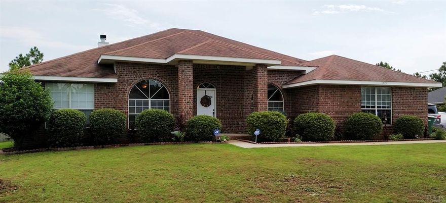 Florida living in Holley By The Sea...NOW available! Split bedroom design with 4 large bedrooms/3 full baths. Love the large master bedroom with a sitting area and a convenient door to the patio...the perfect place for your hottub! Your master bath has a nice soaking tub, separate shower, dual vanities, PLUS two walk in closets! Two of the guest bedrooms share a middle bath. The third guest bedroom has a bath adjacent, which is just off the living area. Speaking of the living area...from the front entrance, you have formal dining and living areas...both are open to the large family room. Just off the family room is the bonus room overlooking the screened patio. The family chef will love the huge kitchen/prep space. Adjourn outside in your screened patio to enjoy the relaxing life! More bonus room ideas (use as an office, exercise room, gameroom) overlooking the backyard.  Tons of cabinet and prep space in this great kitchen.  Extra dining is available at the breakfast bar, or in the dining nook. EXTRAS...throughout are the beautiful engineered maghogany wood flooring and easy care tile.  UPDATES...This home has elegant, updated lighting and neutral colors, which make your decorating so easy!  NEW central heat/air system installed in January 2016 ~ NEWER outdoor shed ~ NEWER bath fixtures and lighting ~ NEW outdoor pond in the garden area!  The outdoor lover will enjoy the screened porch just off the bonus room and dining nook...the perfect place to relax with no mosquitos!  This homeowner has designed a beautiful vegetable garden with the pond, plus if you like fresh eggs, your yard is complete with a chicken coop to house your chickens.  There is plenty of room for an extra garden, or add a pool if you like.  This immaculate home is ready for you!