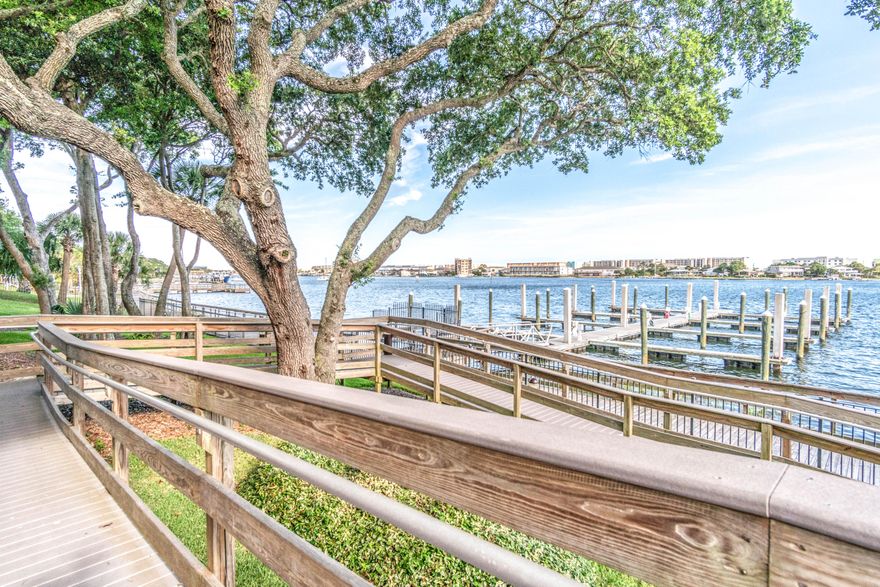 Beautifully renovated condo in the heart of downtown Fort Walton Beach within walking distance to the park, restaurants and entertainment. This condo has amazing views and access to the Santa Rosa Sound along with your own BOAT SLIP. Meticulously renovated from top to bottom in 2016. Renovations include: new AC and duct work cleaning, quartz kitchen counters, new kitchen sink, faucet and stainless steel Samsung appliances. The master bath en suite was completely renovated with marble counters and huge tiled walk in shower. The carpets were replaced and everything had been repainted to include the crown molding and doors. The door knobs have been replaced with brushed nickel as well. Modern lighting has been installed throughout the home. Don't miss out on this one of a kind condo