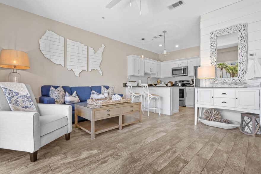 Don't miss out on this stunning condo! This charming end-unit condo features one bedroom and is filled with natural light, offering a view of the water. It can comfortably accommodate up to six guests and has been beautifully designed from top to bottom by a talented interior designer. This is a fully furnished turn-key property! Situated in the heart of Destin's quaint beachside community of Crystal Beach; and has deeded beach access. Lounge by the oversized, seasonally heated pool or the hot tub after a fun day in the sun! Upgrades include custom hall bunks, Wood-like ceramic tile flooring throughout, a jetted tub and shower, a granite surface kitchen counter and bathroom vanity, air conditioning (installed in 2023), a water heater (installed in 2024), a dishwasher (installed in 2025