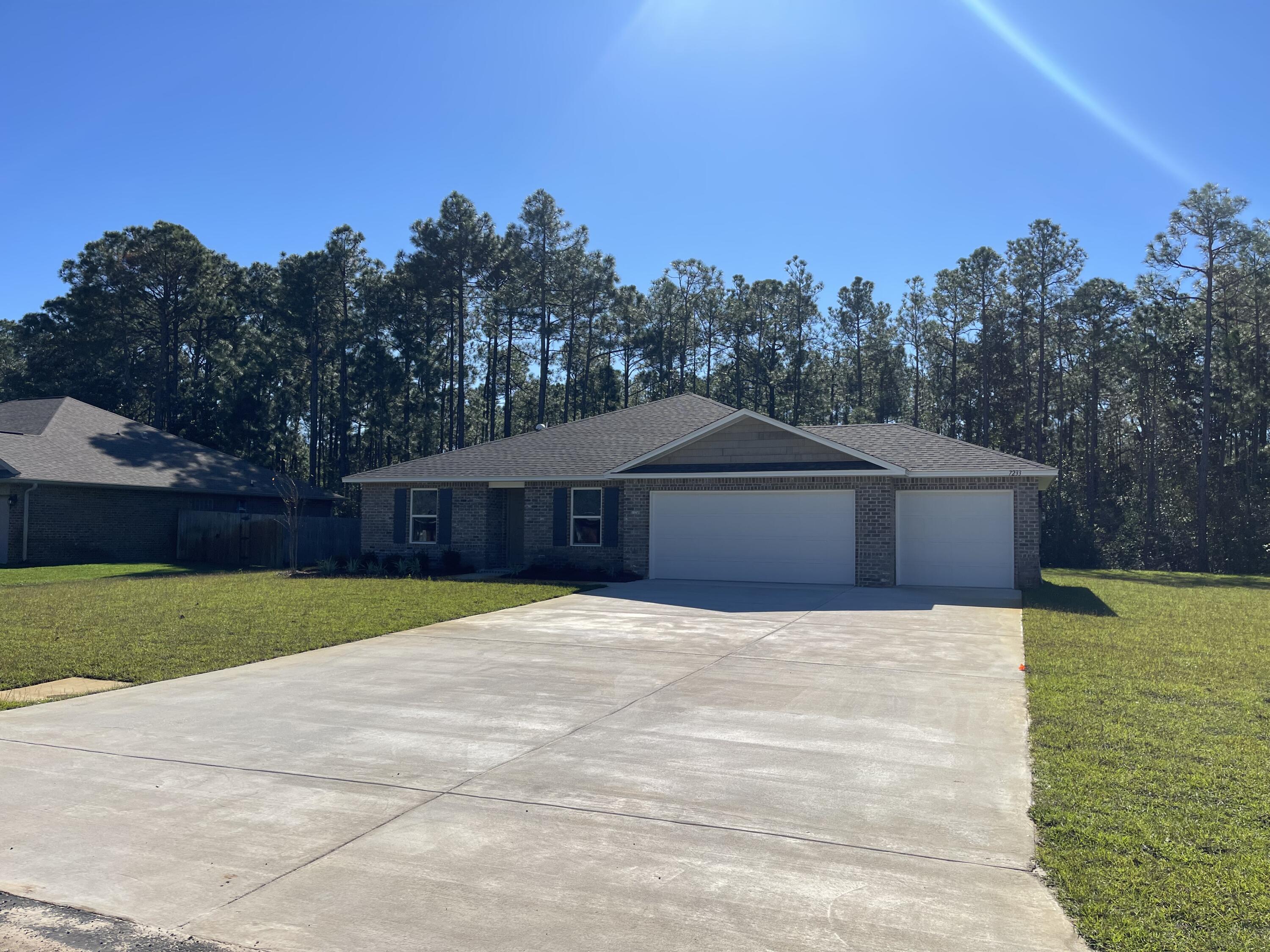 Brand New 4 bedroom home in Holley by the sea! This beautiful home includes a large 3 car garage, stainless steel appliances, kitchen island/bar, open living room, utility room with washer/ dryer hook ups.  In the Primary bedroom you will find a walk in shower,  large vanity with bar, and a walk in closet. Call to schedule a tour today!