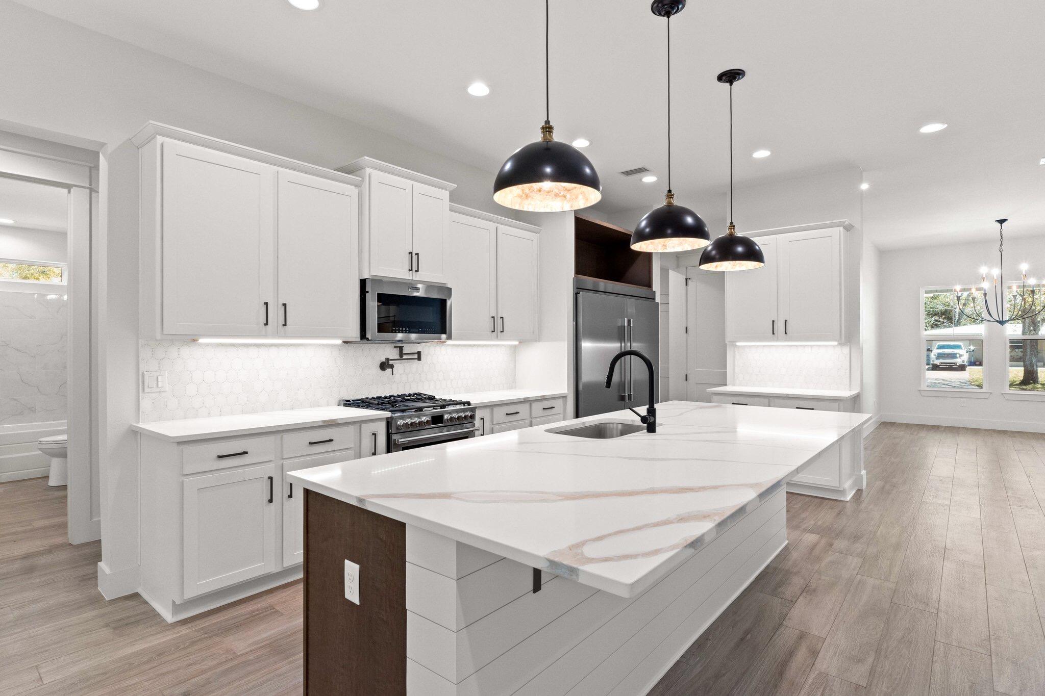 Stunning New Construction in Highly Sought-After Elliot Point neighborhood! Experience luxury living in this breathtaking 4-bedroom, 3.5-bathroom all brick home, nestled in the prestigious neighborhood of Elliot Point. Designed with elegance and functionality in mind, this home features a sophisticated formal dining room and a spacious great room with soaring 10' ceilings, creating an open and airy atmosphere. The 9' ceilings in the bedrooms add to the home's expansive feel.The gourmet kitchen is a chef's dream, boasting an oversized island, 30'' gas range, larger pantry, and a full-size fridge and freezer providing ample storage for all your culinary needs. Beautiful granite countertops add to the high-end finishes, while a tankless water heater ensure efficiency and comfort! Enjoy outdoor living at its finest with an oversized covered back porch & large yard perfect for entertaining. The privacy fence offers seclusion, while hurricane impact-rated windows and doors provide peace of mind.
Don't miss this rare opportunity to own a stunning new home in Elliot Point!
