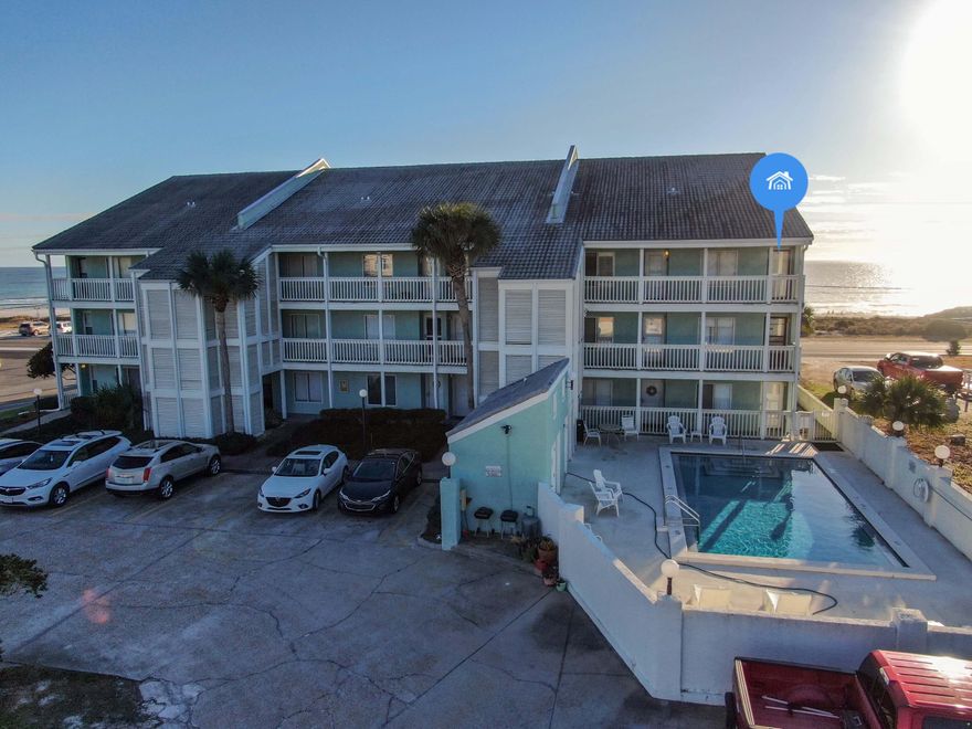 'CURRENTLY UNDER CONTRACT, SELLER WILL CONSIDER BACKUP OFFERS'Best price for a 2 bedroom/2 bath condo with endless views from your balcony and beach access just steps from your door. Located on the west end of Panama City Beach, Emerald Shores Condo is a small complex perfect for a permanent home, second home or investment property. Conveniently located next to the iconic Carousel market and just a short distance from another PCB landmark, Thomas Donuts! Enjoy both sunrises and sunsets in your Dining/living room combo. You have your choice of bedrooms, with one bedroom and full bath downstairs and a second bedroom and full bath upstairs in the loft area. Offered fully furnished, this condo is a must see. Call your Agent today to schedule a visit. All ages, Room Sizes and measurements are a
