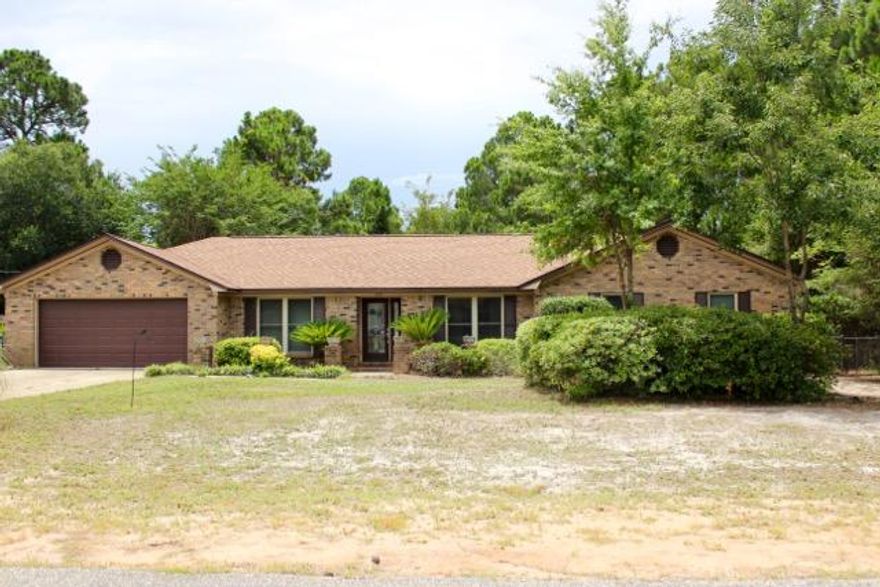 Quintessential Florida Living & Entertainers DREAM!! This house has EVERYTHING you need!! From the moment you walk through the gorgeous front entry until you step out into your expansive back yard with the BEAUTIFUL enclosed pool....you will know you are HOME!! This house has plenty of bedrooms and baths for a large family or for those guests that cannot wait to come visit you! The brick exterior is built to last as are the solid oak cabinets in the kitchen. All 2 and 1/2 baths have been completely updated with BEAUTIFUL finishes and vessel sinks. New construction has NOTHING on the workmanship of this house.The interior has been repainted inside with a soothing neutral color and there is Brand New STAINMASTER carpet in the all the bedrooms in the west wing of the house.