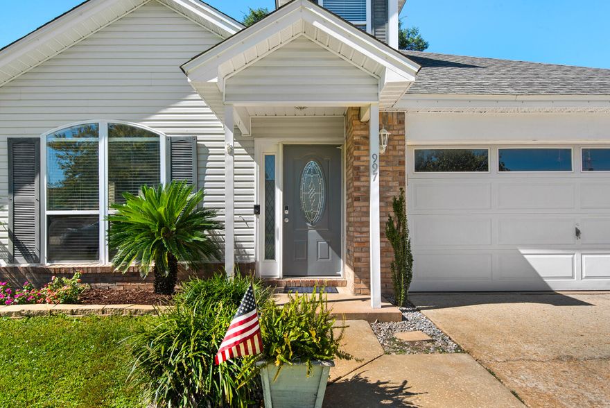 This impeccably maintained four-bedroom home offers timeless appeal and thoughtful design throughout. From the moment you step through the elegant beveled glass front door, you are welcomed into a spacious living room featuring rich wood laminate flooring, soaring cathedral ceilings, and a striking gas fireplace--an inviting space for both relaxation and entertaining. The kitchen is designed for both efficiency and style, boasting abundant cabinetry, a center island with breakfast bar, and a walk-in pantry--ideal for the home chef. Adjacent, a charming screened porch overlooks the fenced backyard, offering a perfect setting for outdoor dining or quiet mornings. The first-floor primary suite provides a peaceful retreat with a generous walk-in closet and a private en-suite bath. Two additional bedrooms are thoughtfully positioned at the rear of the home, creating a functional and flowing floor plan that balances privacy with togetherness.

Upstairs, a spacious loft and fourth bedroom provide flexible living optionsperfect for a home office, guest suite, or media roomenhanced by continued wood laminate flooring and natural light. A truly move-in ready home, blending comfort, quality, and versatility in every space.