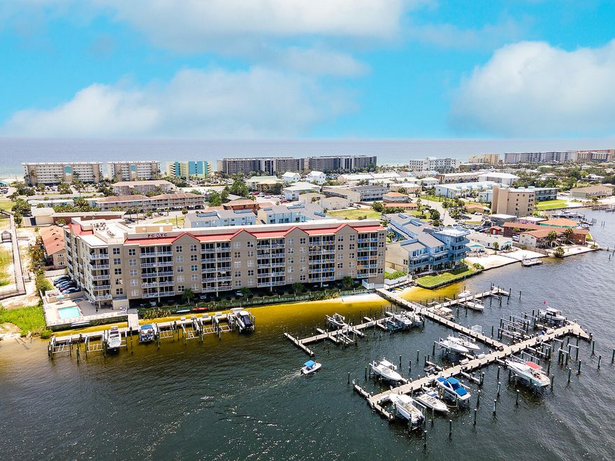 Boat slip included! Palm Court Yacht Club is a gated building on Okaloosa Island. Have you been searching for a boat slip on the intercostal waterway? This 2 bedroom/2bathroom unit is completely remodeled, to include bathroom expansions. It comes with a deeded boat slip, covered parking, and a small storage locker. Come live your best life everyday. See fireworks at The Landing and The Boardwalk, hang out out your balcony or dock, or step right outside onto your boat.