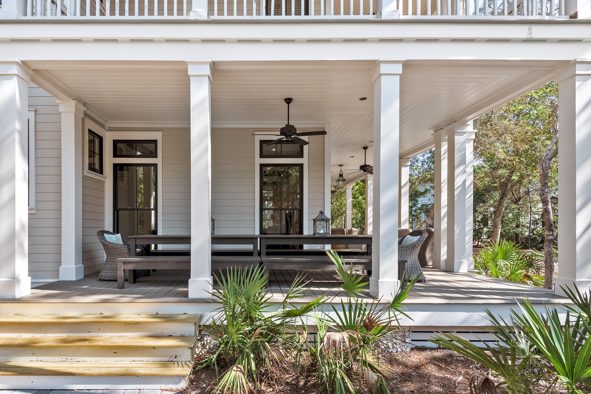 A beautiful Camp District home in WaterColor, adjacent to the reflecting pool, soccer field, and the Camp WaterColor pools. 179 Red Cedar Way is ideally located on an incredible corner lot in the heart of the community's most desired district.With tranquil living spaces, enhanced by almost 1,600 square feet of porch space for gracious outdoor living, the home is a true retreat for time spent before, and after, lazy days at the pool or beach. An indoor fireplace, Wolf and Subzero appliances, upstairs wet bar, luxurious spa finishes, cedar-beamed ceilings and cool coastal furnishings artfully combine to create a home that epitomizes the relaxed elegance of WaterColor.Perfect for family gatherings and carefree weekends at the beach, this gorgeous coastal home will not last long.