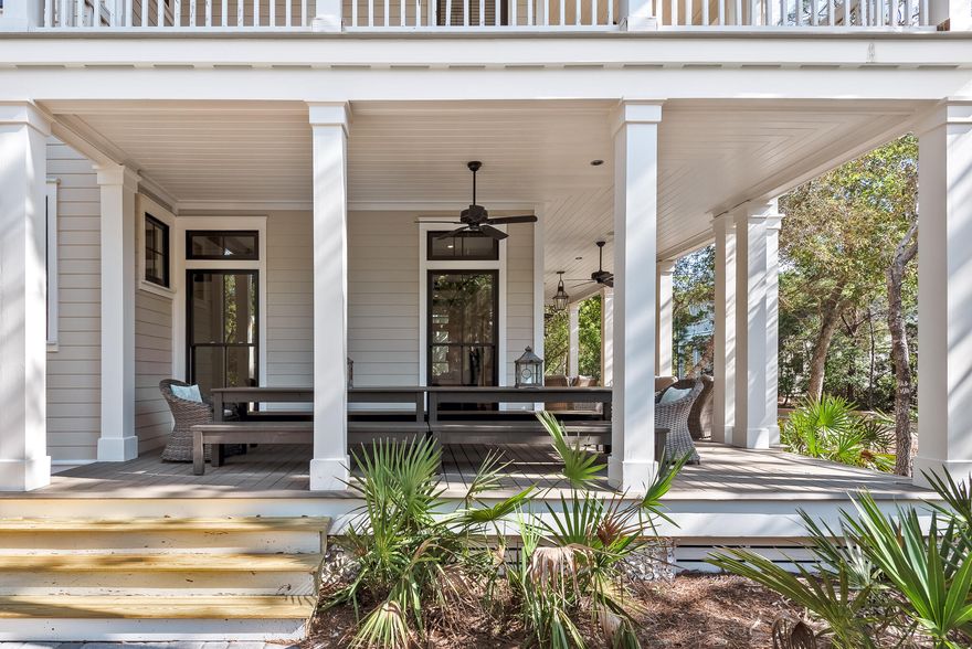 A beautiful Camp District home in WaterColor, adjacent to the reflecting pool, soccer field, and the Camp WaterColor pools. 179 Red Cedar Way is ideally located on an incredible corner lot in the heart of the community's most desired district.With tranquil living spaces, enhanced by almost 1,600 square feet of porch space for gracious outdoor living, the home is a true retreat for time spent before, and after, lazy days at the pool or beach. An indoor fireplace, Wolf and Subzero appliances, upstairs wet bar, luxurious spa finishes, cedar-beamed ceilings and cool coastal furnishings artfully combine to create a home that epitomizes the relaxed elegance of WaterColor.Perfect for family gatherings and carefree weekends at the beach, this gorgeous coastal home will not last long.