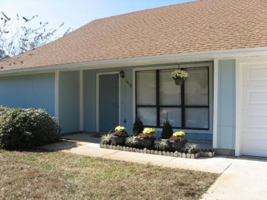 Move-in ready, happy home in quiet neighborhood. Newly painted exterior, updated interior with lots of upgrades and improvements! Garage has been converted to a spacious 12x12 heated/cooled laundry and storage room (with new Coretec flooring) and a 12x12 workshop. Enormous backyard features enlarged concrete patio with oversized sunshade fabric-covered pergola, large garden area with beds and pavers, and 8x8 storage shed. Trane A/C still under warranty, with UV-light air filter. Whole-house RainSoft water softener - no need for bottled water! Pergola and shade trees keep house cool in summer, reducing power costs. Newer large Samsung french door refrigerator. Crown molding, customized kitchen cabinets, and plantation blinds throughout. Washer and dryer convey.