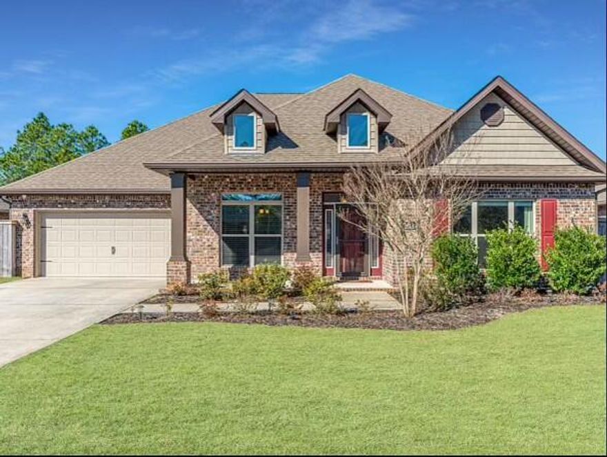 Welcome home to the white sandy beaches of Navarre. This meticulously maintained one-owner, previous-model home is MOVE-IN ready and waiting for its new owners. The impressive floorplan offers 3,113 sq ft of living space. Upon entry, a spacious foyer welcomes you, leading to the right to an elegant dining room and to the left, a versatile den or office. Continuing down the hallway, you'll discover a large living room adorned with trey ceilings, seamlessly connected to the well-appointed kitchen. Boasting granite countertops, stainless steel appliances; (microwave 2024) ,wall oven (2023), dishwasher ( 2023), cooktop (2019), and ample cabinetry for storage, the kitchen is a culinary haven.