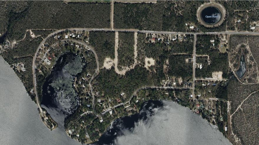 Cat Island Estates. 58 lot single family home residential development. Possible 88 lots by adding additional APPROVED sewer line. 2 Lake Lots, 40 Inner Lots , 16 Squirrel Drive Lots