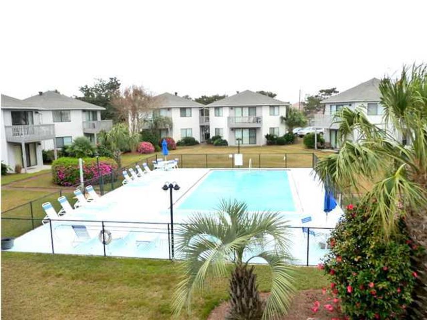 Short sale near the beach! This 2 bedroom-2 bathroom Crystal Village condo features a very bright & open floor plan. Master bedroom has a spacious private bathroom and large vanity with a view of the pool from the master bedroom window. Both bedrooms have wood floors and full size closets with an additional small linen closet in the second bedroom. The beautiful eat-in kitchen has tile flooring, bright white cabinets and appliances and a breakfast bar as well as a closet/pantry located just off the kitchen (washer and dryer do not convey). The living room has tile floors and sliding glass doors leading to the balcony with a view of the pool and tropical landscaped common area. This condo is located just down the street from public beach access and minutes from Destin Commons, Silver Sands