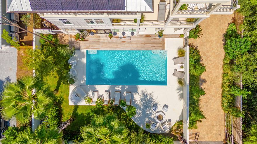 Escape to unrivaled exclusivity! A south of 30A sanctuary with dual water views!  When privacy is paramount, this home delivers...A gated oasis with expansive sparkling pool hidden behind walled gardens and a custom built firepit for alfresco moments under the stars. Seaside sophistication abounds, concrete construction perched wisely at highest elevation for those commanding a legacy home. Elegantly Re-imagined luxury with two state of the art kitchens, opulent Marble baths and verandas with endless views of Draper coastal dune lake exquisistely feeding into the magnificent Emerald Gulf waters!  Exceedingly Rare opportunity, your home near the gulf awaits