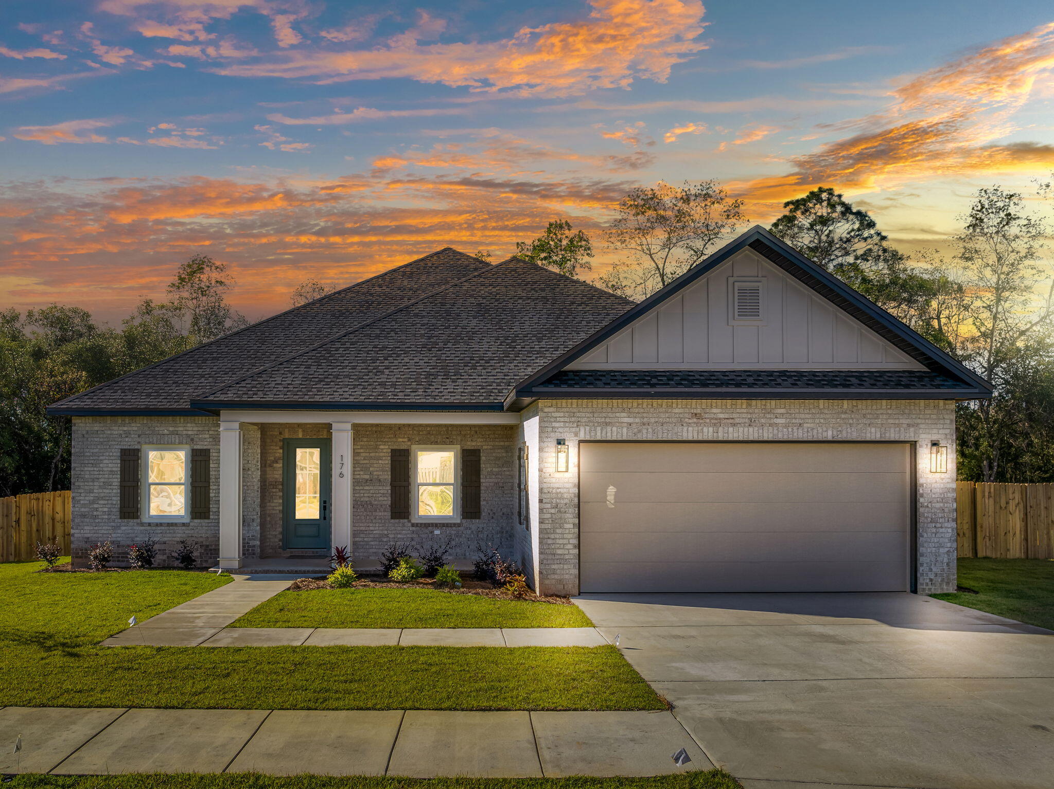 Welcome to the ''Sage Green Estate'' here in Freeport, Florida. Nestled in the heart of Ashton Park community this stunning custom-built, one-story brick home is a true masterpiece of modern design and elegance located just 17 miles from the white sand beaches of the Gulf of Mexico. (Not a DR Horton home) This residence features 4 spacious bedrooms, 3 full bathrooms, 2 car garage with finished attic space, laundry room with a sink, custom built mudroom, covered back patio pre-wired for a full outdoor kitchen, fully fenced yard backing up to a tranquil  forestry and plenty of room to build your custom pool & spa. Spacious foyer with coffered ceiling welcomes you to the open concept living area. Designed for comfort and functionality ....see More... Designed for comfort and functionality the living and dining room are offering the perfect setting for family gatherings and entertaining.
The gourmet kitchen includes top-of-the-line Samsung stainless steel appliances, soft-close cabinetry, a generous island with granite countertops, and a striking tile backsplash that extends all the way to the ceiling. Natural light flows seamlessly through the large windows and the 8 ft glass door for direct access to the outdoor living area.  
Pre-wired for a full outdoor kitchen the back patio offers built-in fireplace, wooden ceilings with recessed lights and a relaxing view of the backyard and natural forestry. Dreaming of your own custom pool & spa? This spacious backyard offers plenty of room to create your perfect oasis to enjoy year round.
The primary suite offers triple windows with a serene views of the backyard, paneled accent wall and a beautiful barndoor. The luxurious ensuite bathroom is complete with a spa-like walk-in shower, free standing soaking tub, split vanities and a custom-built walk-in closet. 
Two guest bedrooms are offering spacious closets, private vanities and a Jack and Jill bath tub and toilet. Third guest bedroom located off the living room can be easily converted into a Study, Home Office or a Den offering large windows and a beautiful 8 ft french door.
Schedule your private tour today and discover why this Ashton Park property could be your dream home! (Buyer and Buyer's Agent to verify all details and information.)