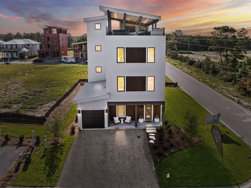*Ask us about our rates starting as low as 5.75%.* Also, ask about the over $100K in upgrades already included in this home at no additional cost! PLUS an add $40K in Flex money towards addl upgrades or buyer's closing costs and/or rate buy-downs!  Est. completion of Sept/Oct!  Welcome to Wildwood at Inlet Beach, which is the perfect blend of modern aesthetic and beachside charm. This brand new coastal community by Bluscape Homes, is sure to impress! Luxury and family-friendly living are perfectly intertwined in this South Walton premier community that is conveniently located to amazing restaurants, shopping and family entertainment, including 30 Avenue, Rosemary Beach, Lake Powell, Camp Helen Gulf front state park, and access to the largest beach access in South Walto You are surrounded by all the dining, shopping, and entertainment you could hope for in Inlet Beach and 30A to provide an amazing coastal lifestyle.

There is a pedestrian underpass on Hwy 98 coming soon for added convenience to access all 30A has to offer, without having to cross Hwy 98.

The SkyBlu is Wildwood's flagship home plan with a roof-top deck that offers 1,000 additional sq ft of living space and an amazing view for miles in each direction. This floorplan offers 6 king-sized ensuite bedrooms and two dens. The optional elevator transports you to the rooftop outdoor oasis for perfect sunsets! The rooftop deck is reinforced for a hot tub, and a luxury outdoor kitchen is available. The SkyBlu plan offers 3 levels of refined luxurious living with upscale interior finishes and features including Quartz countertops, GE Profile appliances, elegant flooring and lighting options, a garage and ample front parking. Make this paradise yours and start enjoying the good life.

** Listing includes base price of home and lot premium. Price may vary based on options selected.**