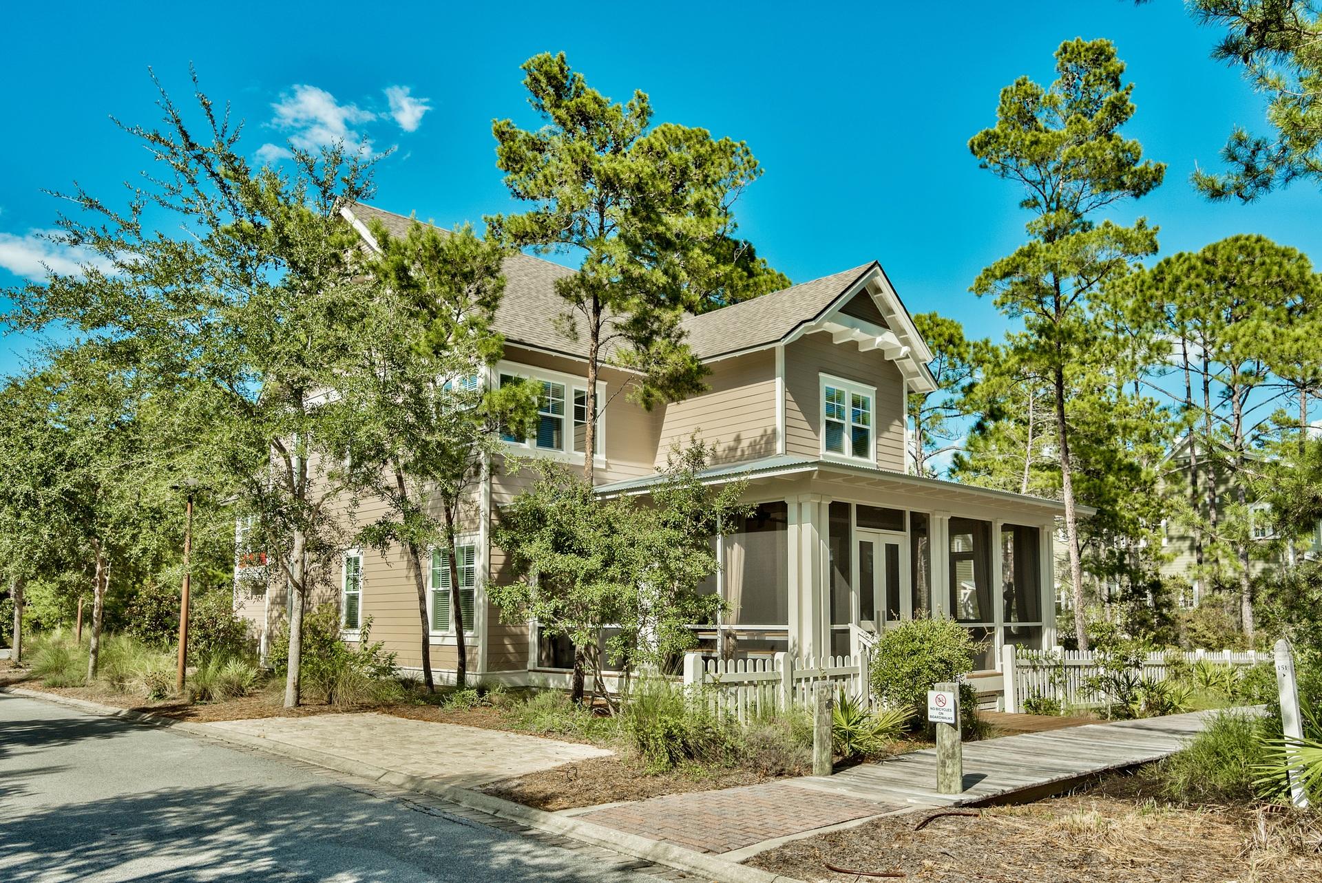 Welcome to your perfect 30a beach home! Located in the private gated community of Watersound West Beach, you will enjoy beach access to one of 30a's premier secluded beaches through Deer Lake State Park. This beautiful home features 5 bedrooms, 5 and one half baths, 2 master suites, built-in bunks, and a full carriage house with private entrance over the garage. With just under 3400 square feet, this is the perfect home for entertaining family and friends as there is room for everyone! The first floor has awonderful open floor plan with a spacious kitchen boasting a large granite topped island and breakfast bar adjoining the dining area that flows into the great room. French doors open from the great room to a huge screened porch with both dining and living areas. There is also a private master suite on the main level that features a glamorous bath with 2 vanities, garden tub, large shower, and walk-in closet. A powder room and laundry complete the first floor. Upstairs, there is another spacious living area with built-in bunks, another master suite, and two additional guest rooms, each with ensuite baths. In addition to the lovely and spacious main house, there is also a private carriage house over the 2 car garage with it's own entrance. The carriage has a combination living/dining room with full kitchen and also a separate bedroom/bath. There is also an "extra" laundry room in the garage that is perfect for your carriage house guests! This home is located on a large corner lot in a quiet section of the neighborhood with plenty of parking. Watersound West Beach features a community pool/clubhouse, puttering park, boardwalks for walking/biking, boardwalk to the beach, and fitness center at Watersound Beach. Enjoy the beach life!!!