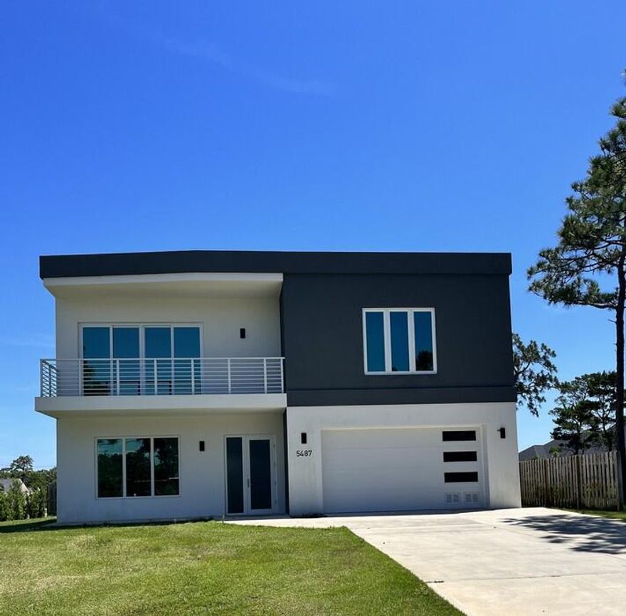 Welcome to stunning newly built ICF (Insulated Concrete Forms) property on spacious corner lot! This luxurious Single Family home offers unparalleled craftsmanship and design throughout. It provides ample space and modern conveniences to enjoy comfortable living. The home is energy efficient and hurricane safe. No Association. No restrictions. Suites well for a single family with kids and pets or for working from home professionals or for the retired couple - or is perfect to run Air B&B! The house features steel reinforced ceilings and floors that are thermally insulated and moisture protected. Flat concrete roof assumes record-long warranty. No wood framing - no termites! Exterior stucco for minimum maintenance. All aluminum windows and doors are low-rate UV and Large Missile Impact safe glass.  Bosh A/C system is completed with a Humidity Control unit. LED lightning throughout interiors and exterior. Custom designed masterpiece floating stairs are completed with natural hardwood steps and stainless steel railings that are fingerprints free. Direct Vent Wood Fireplace stands out in bright and open Living Room. Modern kitchen with matte glass cabinets is also equipped with durable hardware for soft self-closing drawers. Cooking exhaust vent filters to outside. All stainless steel appliances include 44-Bottle Dual Zone wine refrigerator. Fine finish materials include granite countertops, marble tile backsplash, and natural stone fireplace. Porcelain tile flooring and trend design vanity cabinets in all bathrooms are imported from Europe. Each bathrooms have an operable window. Solid core 92" toll interior doors assembled with stainless steel hardware and modern hidden hinges, designer handles, and magnetic locks. Plenty of walk-in spacious closets completed with functional organizers. Automatic sprinklers system is installed to ensure lash green lawn. Many more extras plus public boat ramp is only minutes away. Truly exceptional home to enjoy the luxury and comfort of Florida living!