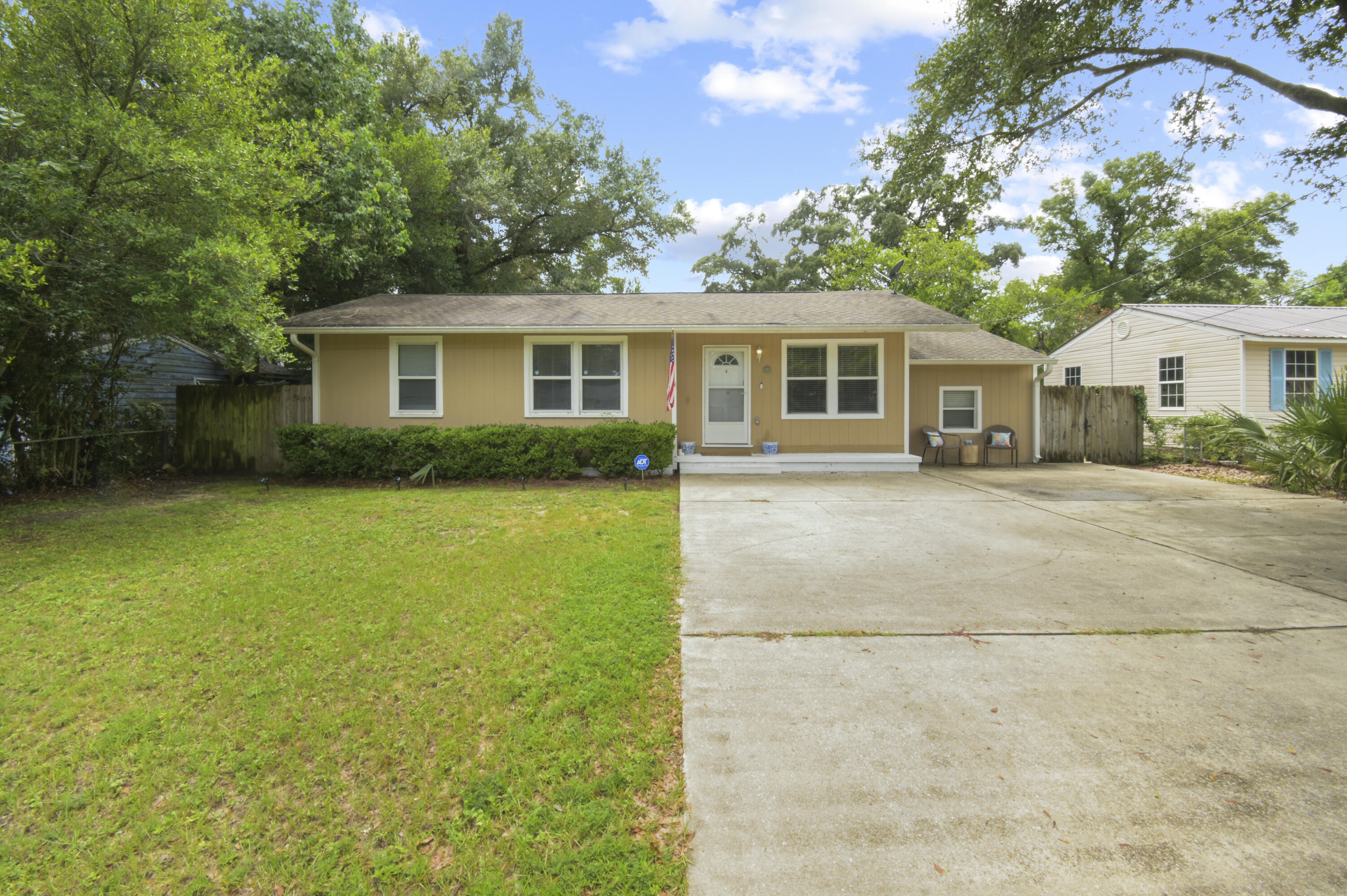 POOL HOUSE! This renovated 4-bed home offers the perfect blend of southern charm with an array of modern updates! Major highlights include a POOL, a WORKSHOP WITH POWER, a HUGE COVERED DECK, and UPDATES THROUGHOUT! Step into the open concept central living area seamlessly connected to the dining area and updated kitchen! The master bedroom is massive with a vaulted ceiling and an en-suite, while the three additional bedrooms leave plenty of room for kids, guests, and an office! Featuring NO CARPET throughout, cleaning will be a breeze! Stepping out back, you are greeted by a MASSIVE 200+ SQFT COVERED deck overlooking the sparkling POOL! The pool is perfect for cooling off in and even has a wraparound deck for tanning! The yard also has a LARGE, DETACHED WORKSHOP WITH POWER! Stop on by and make this amazing house your home today!!