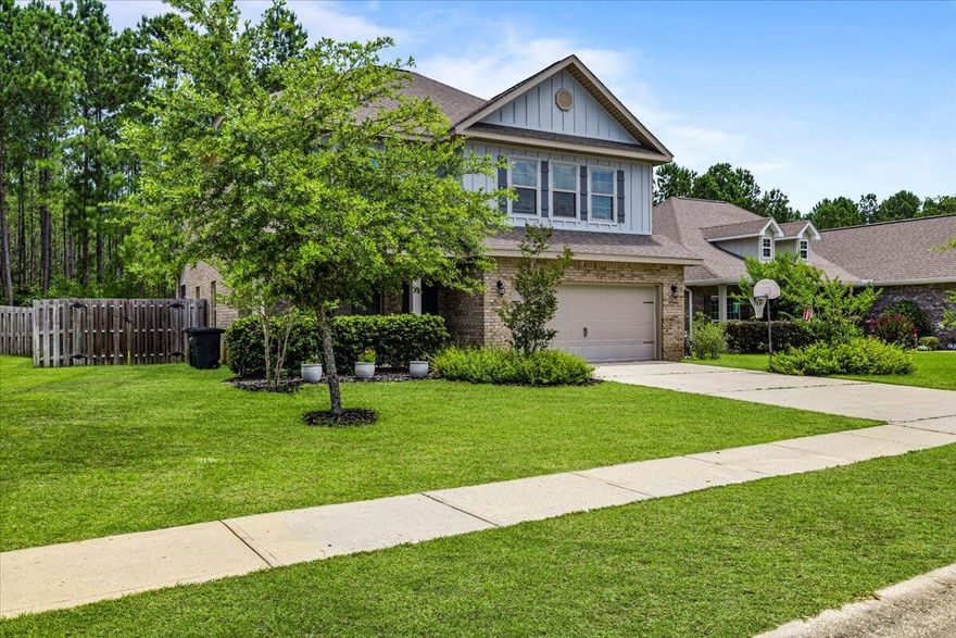*** PRICED TO SELL****Perfectly positioned in a no-through traffic street in the Whispers neighborhood, this craftsman style home offers the perfect blend of community living and privacy.  The back of the property spans along a wooded conservation area, providing the homeowner ultimate privacy while still enjoying exclusive access to the community's world class amenities.This residence's open concept floor plan offers practicality and provides the perfect space for friends and family gatherings. The contemporary designed kitchen is equipped with luxury Cambria quartz countertops, showcasing an extra-large island, a fireclay apron front farmhouse sink, upgraded custom built soft-closing cabinetry and a large walk-in pantry. Also on the first floor, you will find the primary suite featuring elegant crown molding, and a spacious walk-in closet. The master ensuite bathroom offers a 6ft tile walk in shower, and a granite vanity with dual sinks. 

The additional 3 bedrooms are located upstairs, as well as the sizeable flex room, which can be used as an office, a media room or it could be enclosed to create a 5th bedroom, according to your lifestyle's demands.

The home features a wealth of conveniences, including:
An over-sized 2 car garage.  The HVAC has been upgraded with an UV light system, to improve the air-quality of the entire home, in addition to help extend the lifespan of the HVAC system itself.  The first-floor features 22mil, commercial grade LVP flooring. Built to withstand high foot traffic, including a thick underlayment to enhance sound absorbing properties and increase thermal insulation. 
A screened in back porch, facing the backyard. The private and expansive backyard presents the perfect canvas for a luxurious outdoor oasis. It is ideal for creating both recreational and relaxation zones tailored to a high-end lifestyle.

The Hammock Bay neighborhood boasts a variety of on-site amenities.
This full-service development includes a 60-acre sports and recreation park, featuring tennis and pickle ball courts, basketball courts, kids' playgrounds, a newly designed fitness center, 10,00sf club house with an outdoor grilling area, a movie theater, and a resort-style swimming pool complex.  A 30-acre future school site, as well as a town center featuring a brewery, a general store, an amphitheater and the canine commons.
Over 14 miles of bike and hiking paths, situated along 26 lakes for recreational activity, in addition to a lakeside club house, the entire Hammock Bay project sprawls over 3,000 acres. 




