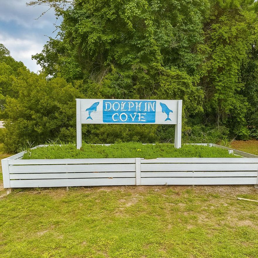 Build Your Dream Home in Dolphin Cove Estates! Don't miss this rare opportunity to own one of the last remaining lots in the sought-after Dolphin Cove Estates. This spacious 0.44-acre homesite offers a partial water view and serene setting surrounded by mature trees and lush greenery--perfect for creating the private oasis you've been dreaming of. Centrally located for access to Destin or Santa Rosa Beach. Enjoy the natural beauty and tranquility of the area with Choctawhatchee Bay just moments away, where sunsets and local wildlife offer a peaceful retreat. Outdoor enthusiasts will appreciate the two public boat ramps only 4.5 miles away, as well as nearby parks and playground. You're also just 0.7 miles from Nick's Restaurant and beach a local favorite for swimming, paddle boarding, fresh seafood and relaxing!