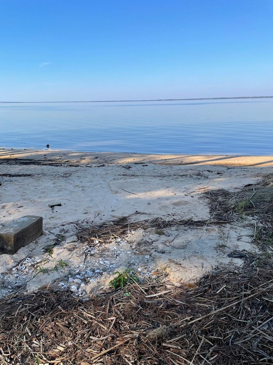 Great setting on a beautiful heavily wooded lot on a dead end street to build a home with new homes already being built.  Bay access  is 1/10 mile from lot, a short 3 blks. Kayak, Canoe can be put in at the end of Cabbage Rose.   Paved roads for walking, biking.  Hiking on trails in the Pt Washington Forest on Hwy 283, both on the North side of Hwy 98 and  South of 98.  Public Beaches are approx 5 miles on Hwy 283 to Grayton Beach with access to Restaurants and shopping on 30A. No HOA fees.  Located in a Zone X with no flood insurance required.