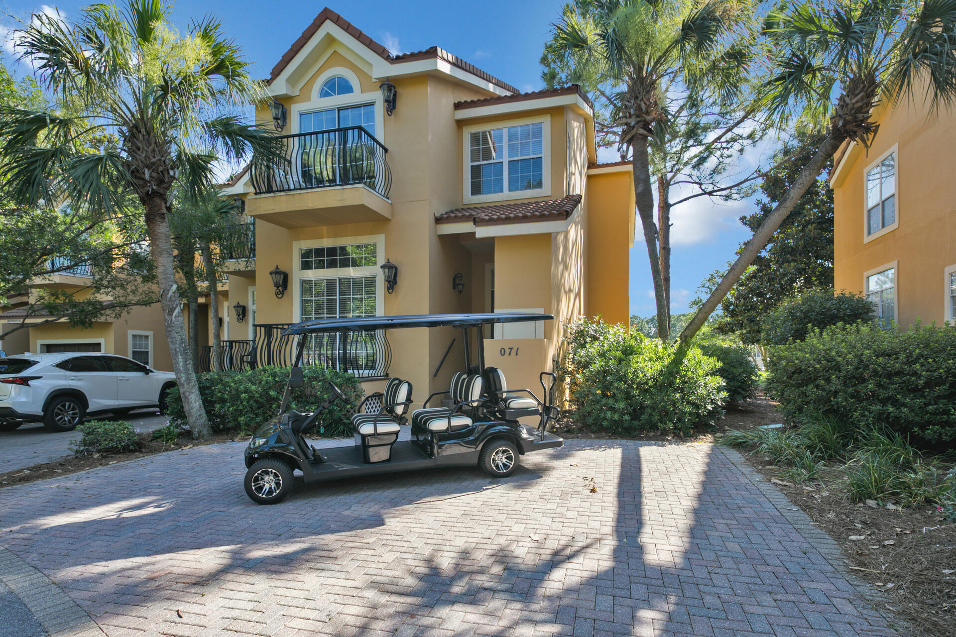 Fully furnished available for winter monthly rental 10/19/2025-4/1/2026. Contact 850.608.6078 for details. Nestled between the bay and championship golf courses, 'Amazing View' in the upscale Vantage Pointe community offers 3 floors of luxury living plus a 6-seat golf cart. This 4BR/4.5BA townhome sleeps 11 and features an open-concept main level with a full kitchen, stainless appliances, stone counters, breakfast bar, coffee bar, and screened porch overlooking the fairways. The master suite offers a king bed, fireplace, balcony, and spa bath; guest rooms include private en suites, and the top floor is a kid-friendly retreat with 3 twin beds and HDTV. Enjoy serene surroundings, spacious comfort, and easy access to resort-style amenities.