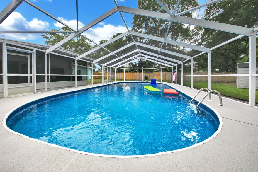 This Florida cottage with screened POOL is ready for new owners! The home has gone through a tremendous renovation to include new LVP flooring through-out the house, new kitchen cabinets with soft close drawers and doors, quartz counters & backsplash, new paint inside and outside. Both plumbing and electrical have been updated as well. This home has 3 good-sized bedrooms. The master bath includes a large tiled walk in shower, new vanity and fixtures. The hall bath includes a tub with tiled shower surround. The ample sized living area has new sliders that lead to the cute screened porch and pool enclosure. New pool equipment and sprinkler system keep pool and yard maintenance easy. There is still plenty of yard space for play equipment and pups! Roof 2013, AC 2009, WH 202