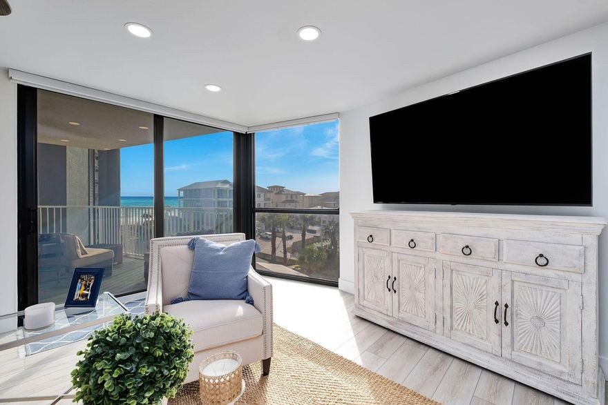 Under contract with a 72 hour kick out clause. Completely remodeled from the studs up, this gulf-view condo has been entirely renovated, including a new roof in 2023. As well as new bumped-up ceilings, it has a new mold-resistant drywall, a fabulous new kitchen floor plan and all new fixtures and finishes. It's like no other unit in Mainsail. Immaculately finished and never rented out, it's the perfect vacation home or rental investment property. The entrance door opens into a bright, open living space with the additional ceiling height immediately evident. Multiple windows invite natural daylight. Plantation shutters and remote-controlled blinds allow ample sunlight to filter through, lighting up the new LVP plank flooring and neutral decor. Tasteful newer furnishings from Pottery Barn are included in the sale. The new kitchen spans the entire width of the living area, allowing ample space for a host of white cabinets and newer stainless steel appliances, including a dedicated beverage refrigerator. A separate closet houses a stacked washer and dryer. The generous quartz-topped island creates a natural social hub for evenings at home, enjoying leisurely meals and card games together. The neat bar unit is perfect for housing your coffee maker, wine glasses and cocktail paraphernalia when entertaining family and friends. Move into the sitting area and watch TV beneath soft recessed spotlights. Hurricane-resistant sliding doors offer views of the beautiful Gulf of Mexico with gorgeous southwesterly vistas from the furnished balcony. Relax and listen to the waves from this fourth-floor eyrie while playful breezes keep you refreshed. Two large bedrooms include a master suite with separate his-and-hers closets. The pristine ensuite bathroom has a twin quartz-topped vanity and a frameless glass shower over the tub. The second family bathroom is equally modern and well-appointed. Mainsail is a desirable gulf-front complex with direct access to the picture-perfect white sand at Miramar Beach. As well as deeded beach access, the condo offers a resort-style community pool, kid's pool, hot tub, tennis/pickleball and volleyball courts, a clubhouse, exercise room and gated security. Outlet shopping, grocery stores and restaurants are all conveniently close by. For those who want a beachfront hideaway with no need for any updating, this turnkey home could be the answer to your dreams.