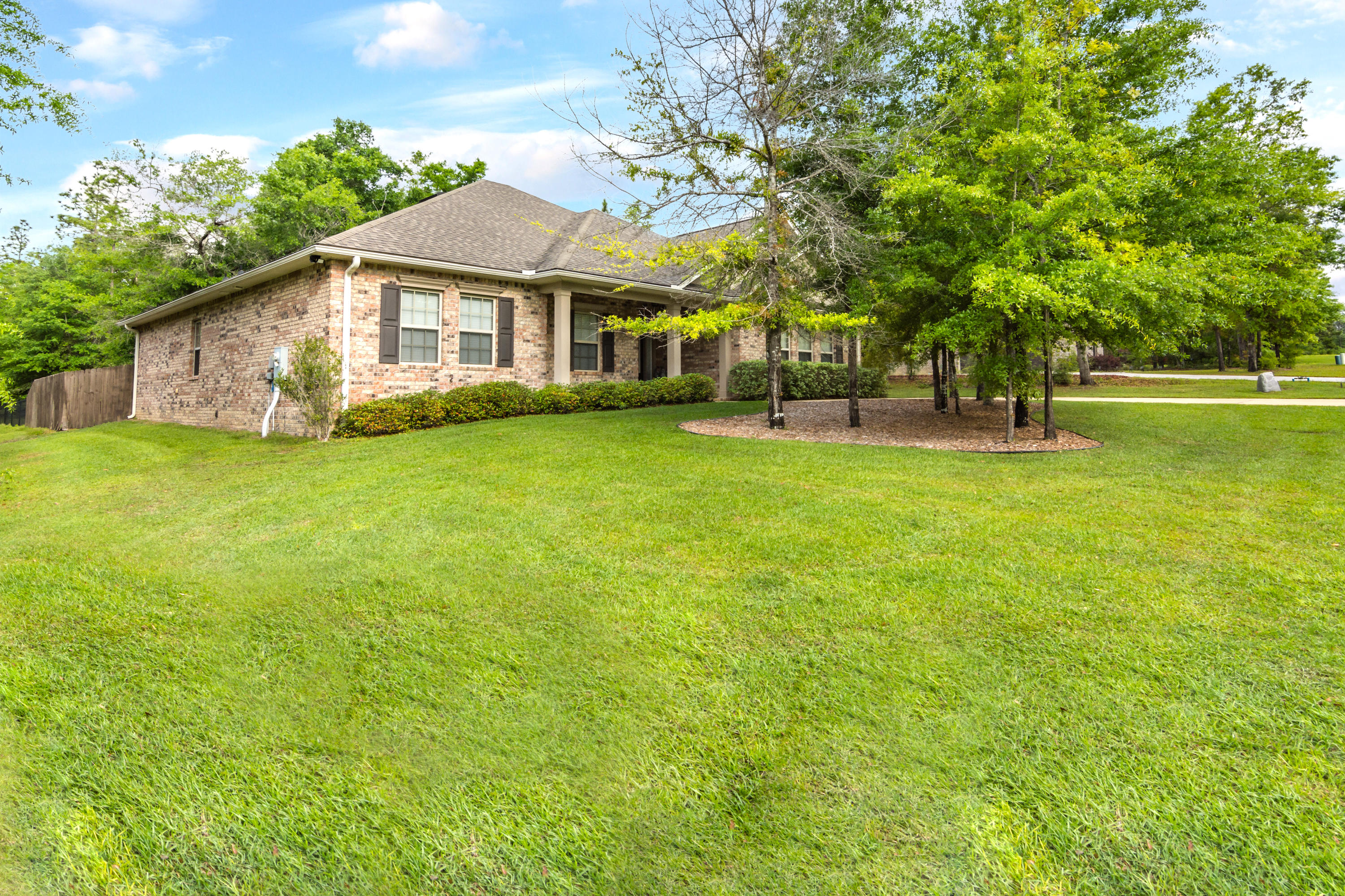 Beautiful home that has been very well cared for and it shows!! Great curb appeal - this 4 bd/2.5 ba brick home is accented with decorative pediments and boasts lush green grass and landscaping. The interior of the home is in like new condition and features a large entryway and spacious open floor plan. The kitchen has beautiful cabinetry, stainless steel appliances and granite countertops. The master suite is large enough to accommodate your massive furniture, features a sitting area and nice master bath complete w/ dual vanities, garden tub, separate shower and walk-in closet. The additional bedrooms are all a nice size; central vac system throughout home is a unique feature. Terrific backyard which is fully fenced and has a covered pavilion great for get togethers, boat parking, etc.