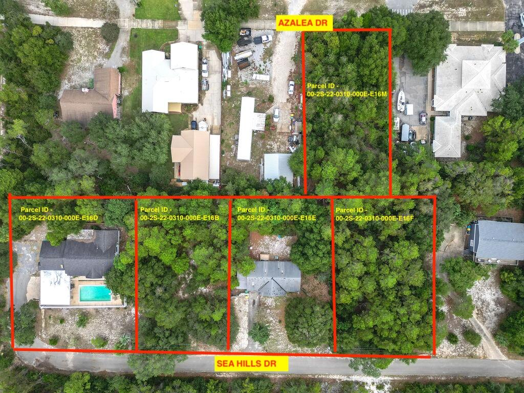 Investment Opportunity ~ Selling five contiguous parcels and sold as Vacant Land in Destin located in a residential neighborhood, of which two parcels have structures-one of which is 523 Sea Hills Dr. with a single-family home with pool built in 1977, and the other 527 Sea Hills Dr. with a single-family built in 1965.  The other 3 parcels are vacant. Parcels zoned currently for residential use -zoning classification ROI-VR (Residential Office, Institutional).  Buyers to do due diligence and verify all dimensions