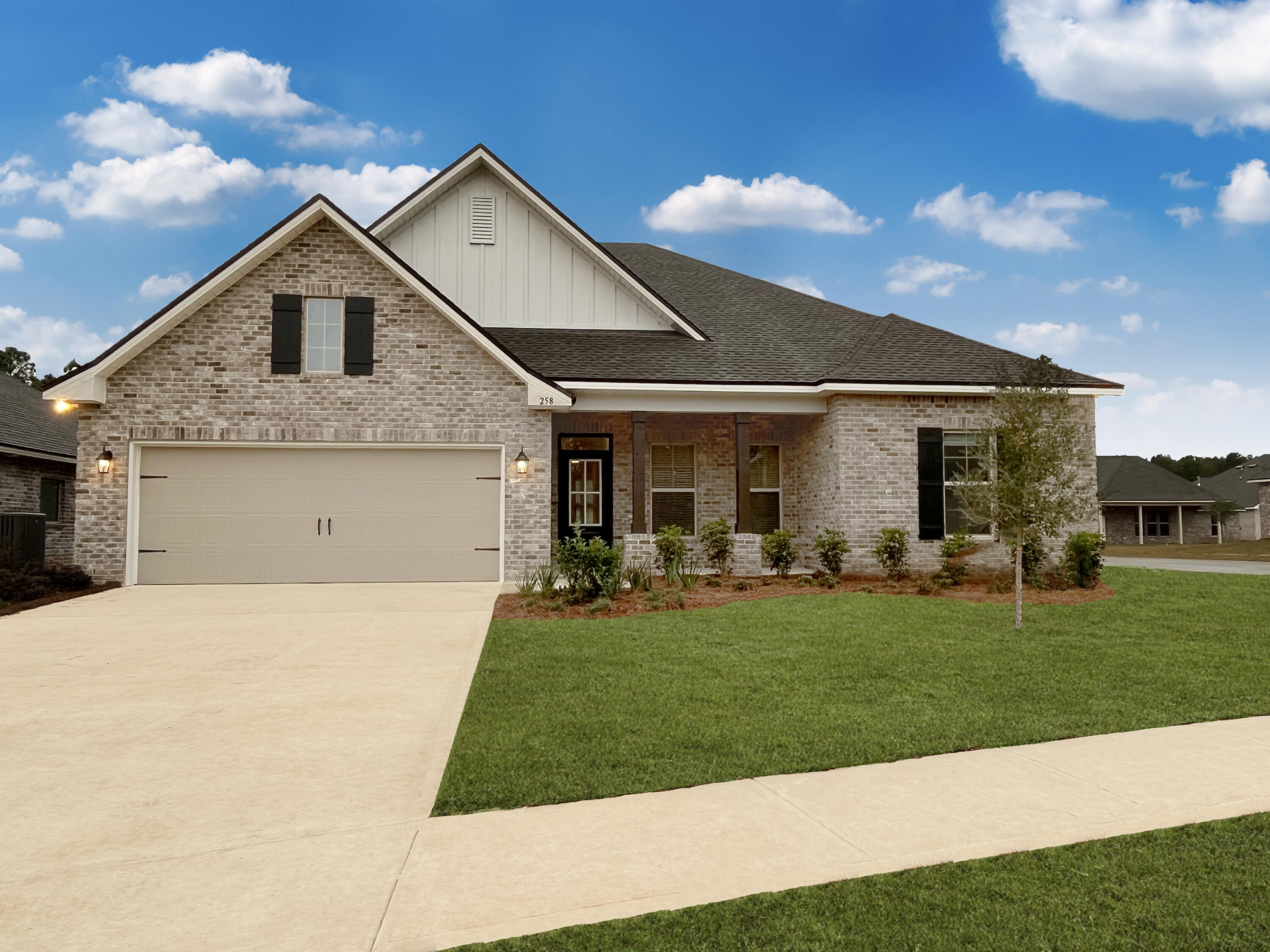 The Comstock III H in The Trails at Hammock Bay community offers a 4 bedroom, 2 full bathroom, open design. Upgrades added (list attached).Special Features: double vanity, garden tub, separate custom tiled shower, and walk-in closet in the master bath, double vanity in the 2nd bath, kitchen island, walk-in pantry, boot bench in the mud room, covered porch and patio, recessed can lighting, undermount sinks, bronze plumbing fixtures, framed mirrors, smoke and carbon monoxide detectors, landscaping, architectural 30-year shingles, flood lights, and more!Energy Efficient Features: a tankless gas water heater, a kitchen appliance package with a gas range, vinyl low E MI windows, and more!