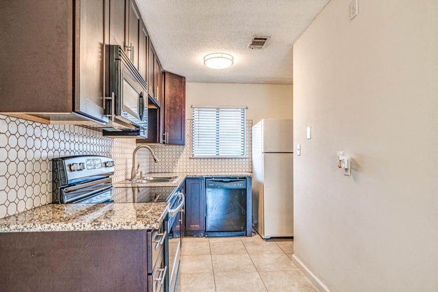 Centrally located townhome! Perfect starter home or Investment property. In close proximity to Uptown Station. Corner end unit. New AC 2017. Tile flooring throughout home and carpet in bedrooms. Kitchen boasts updated cabinets, granite countertops, and elegant backsplash. Kitchen appliances except fridge were replaced 2017. First floor shows a spacious living area and half bath for guests. Pool and surrounding areas are nicely maintained. Great location close to shopping, groceries, restaurants, and exercise areas.