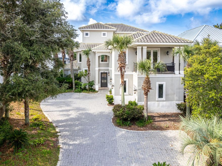 Positioned along Scenic Highway 98 within the gated community of Destiny East, this impressive three-story residence offers an exceptional combination of scale, comfort, and gulf view corridors just moments from the shoreline. Spanning 4,339 square feet with five spacious bedrooms, the home presents a rare opportunity for those seeking a fully furnished coastal retreat with strong rental potential in one of the area's most desirable locations.Thoughtfully updated and professionally decorated, the residence has undergone more than $200,000 in recent improvements, creating a refined yet relaxed atmosphere throughout. The open floor plan invites effortless entertaining, with large windows that draw in abundant natural light and highlight the home's generous living spaces. At the center of the main living area, the chef's kitchen features stainless steel appliances, granite countertops, and custom cabinetry designed to support both everyday living and large gatherings.

Outdoor living takes center stage with oversized wraparound balconies that capture beautiful southwest views toward the gulf. These expansive spaces provide the perfect setting for morning coffee, sunset cocktails, or relaxed evenings enjoying the coastal breeze.

A private elevator services all three levels, adding convenience and accessibility throughout the home. The top floor is dedicated entirely to the primary suite, creating a private retreat that includes a spacious sitting area with western views, a custom bar, and a luxurious ensuite bath with dual vanities. The thoughtful layout provides privacy and comfort for both owners and guests.

Additional highlights include a two-car garage with a dedicated golf cart parking stall, along with the inclusion of furnishings, televisions, and a golf cart, making the home turnkey for immediate enjoyment or rental use.

Recent upgrades further enhance the property's value and efficiency. The second-story balcony was completely rebuilt in 2024, attic insulation was added the same year, and new air handlers serve all three levels. Tankless hot water heaters have been installed throughout the home, while new blinds provide a clean, updated finish across the interior.

The expansive homesite also offers the potential to add a small private pool at the front of the property, creating an additional outdoor amenity to complement the nearby beach access and lakefront community pool.

Residents of Destiny East enjoy access to a wide range of amenities designed for both relaxation and recreation. These include multiple community pools, a spacious clubhouse, tennis courts, fitness center, spa-style pool area, playground, grilling and picnic areas, pavilion spaces, and even a private IMAX movie theater.

With its generous scale, recent improvements, turnkey furnishings, and close proximity to the beach, this coastal residence represents an outstanding opportunity to own a gulf-view home along one of the Emerald Coast's most sought-after corridors.