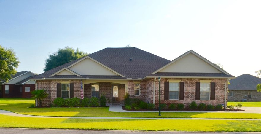 This home offers tons of CHARM. You will be greeted at the entry with 9' ceilings, crown molding, recessed lighting, custom built in storage bench, and hardwood flooring leading into the living room, and dining area. Kitchen features beautiful mosaic tile back splash, granite counter tops with breakfast bar and maple cabinetry under lit throughout. Stainless steel appliances. Two large pantry areas. Indoor laundry. Split floor plan with a half bath near living room to accommodate guests. All bathrooms feature granite and porcelain tile. Relax in your master suite with two vanities, garden tub, sep shower and walk in closet. Large enough to hold any furniture! Enjoy your morning coffee in the screened in porch off the back of home and grill out on your patio. Large green space adjacent.