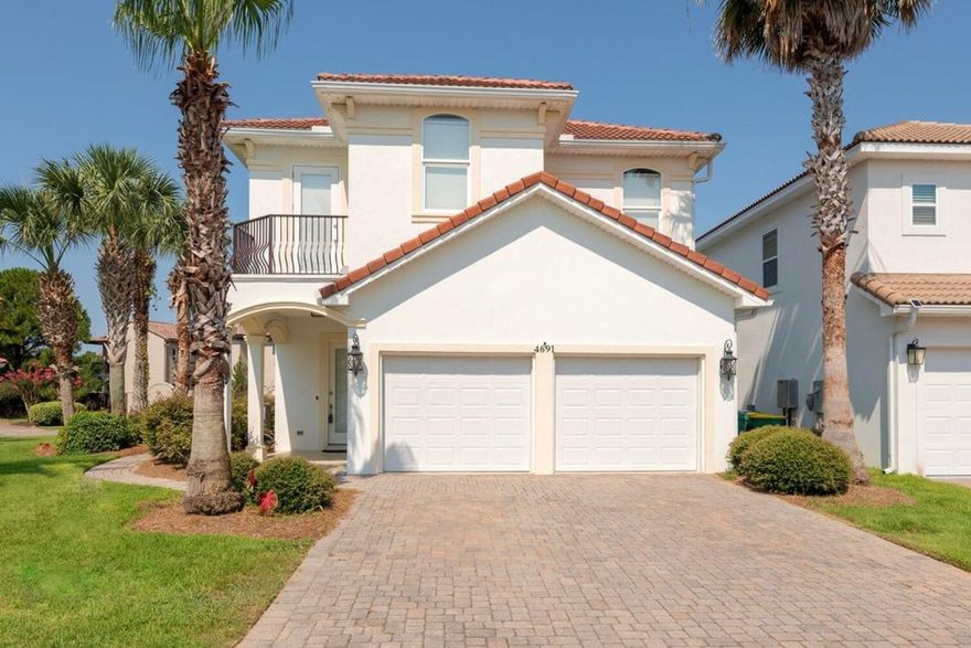 Beautiful Tuscany-style smart home in gated exclusive Calusa Bay. This 4-bedroom, 2.5-bath residence boasts a spacious open floor plan with 20'' tiles, a kitchen featuring granite countertops and stainless- steel appliances, a master suite with a soaking tub, walk-in shower, and private balcony. Smart home features abound, including Wi-Fi-enabled: lighting, heating, cooling, security system, cameras, water heater, washer/dryer, and sprinkler system. This home offers access to community amenities such as a swimming pool, beautiful ponds, and fountains. Ideally located within walking distance of the beach, schools, shopping, and entertainment, this home seamlessly blends elegance, comfort, and modern convenience. NOTES: * $499,000 Firm