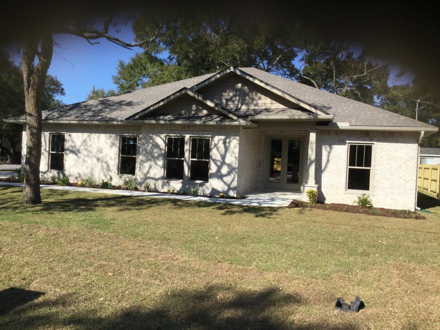 One of 2 Brand New All Brick 4BR/3BA homes under construction on Yancey Street and ready for move in by November 2018. Centrally located in Ft. Walton Beach minutes away from beaches, bases, and shopping. Open concept floor plan with 10' ceilings in main living areas /kitchen, luxury vinyl plank flooring throughout and plush stain master carpeting in bedrooms. Large open kitchen has ''white shaker style'' cabinetry with soft close doors, 12ft center island with pendant lighting, granite countertops, Kenmore stainless appliances with counter depth fridge and large pantry. Main living areas , Master bath, and kitchen have large crown trim, recess lighting, and trayed ceilings. ''Shaker Style'' interior doors and casing, 6' baseboards, & upgraded lighting/ceiling fans throughout.